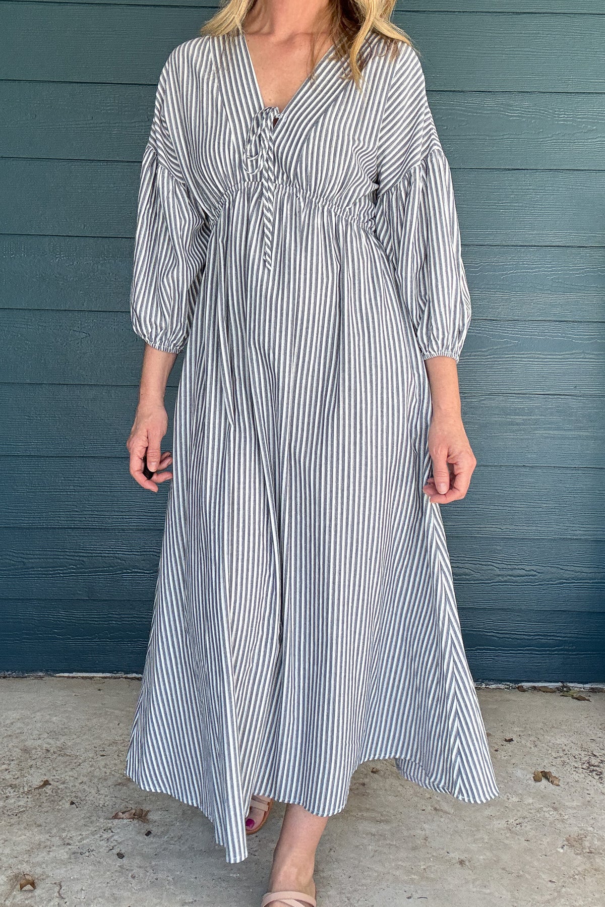 Get beach-ready with our To the Beach Dress! This lightweight and unlined dress offers the perfect arm coverage and a flattering maxi fit. Throw it on for a day out in the sun or as a stylish cover-up. No matter how you wear it, this dress has got you covered (literally)!