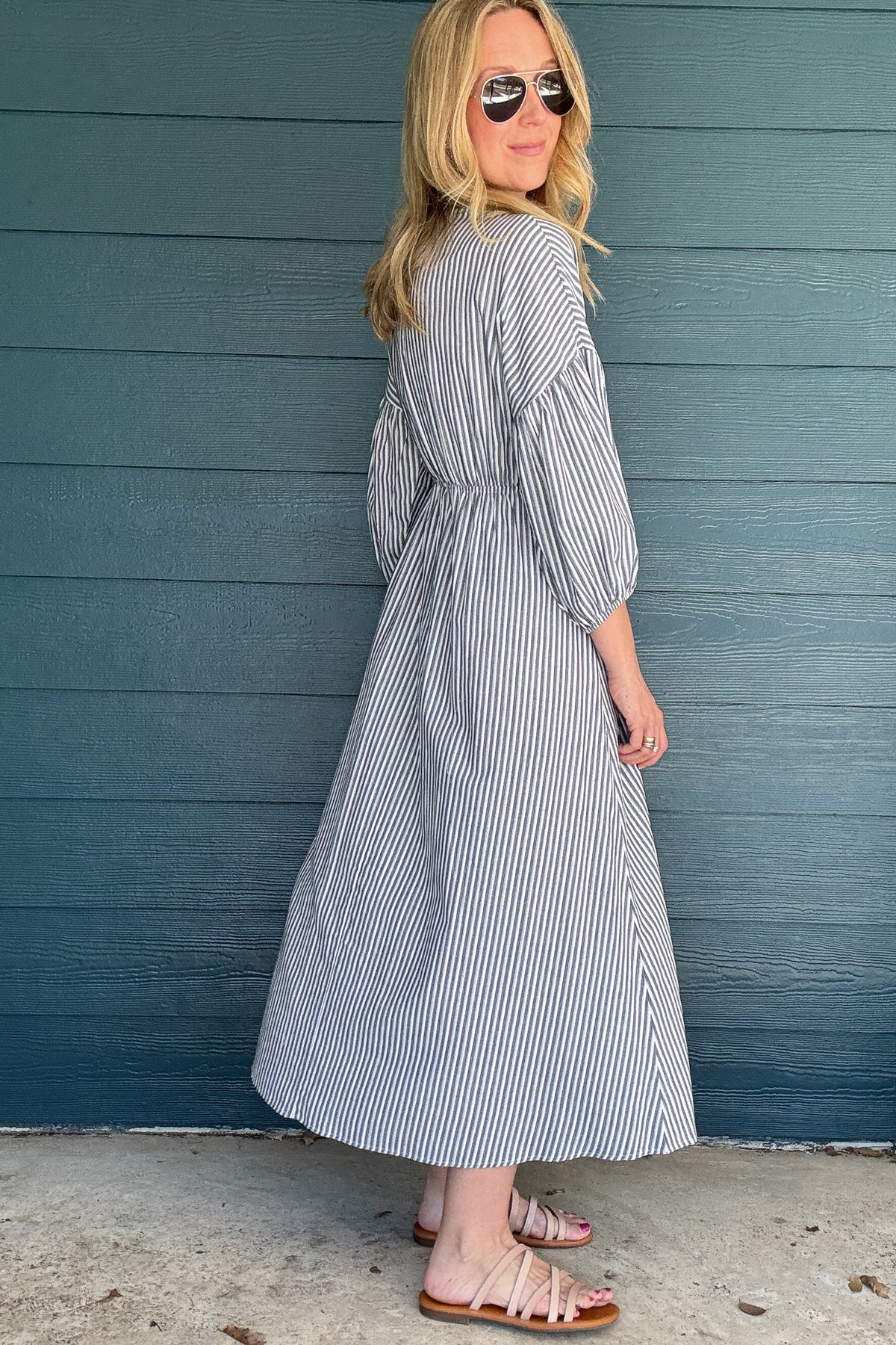 Get beach-ready with our To the Beach Dress! This lightweight and unlined dress offers the perfect arm coverage and a flattering maxi fit. Throw it on for a day out in the sun or as a stylish cover-up. No matter how you wear it, this dress has got you covered (literally)!
