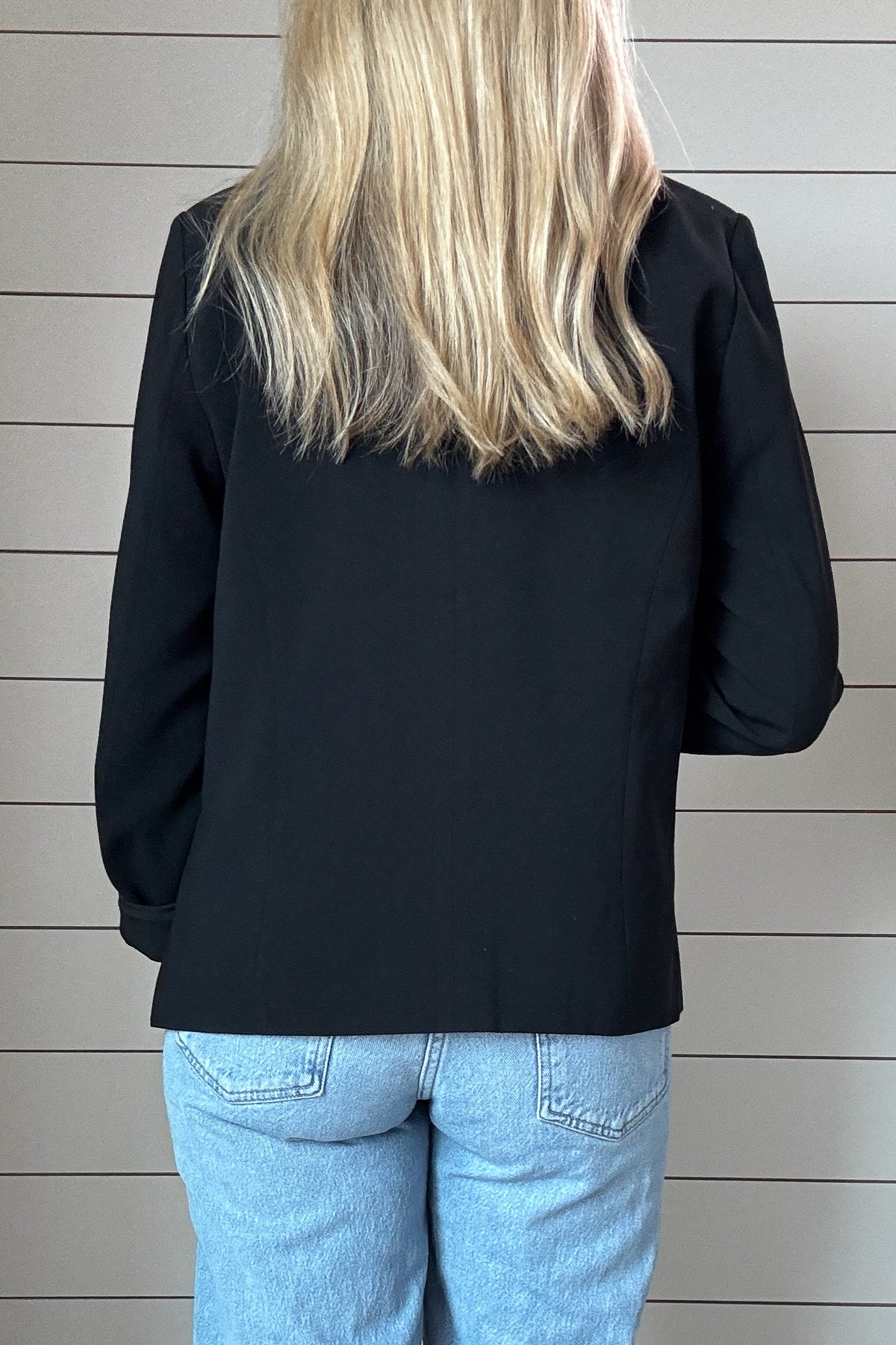 Elevate your wardrobe with our essential black blazer. Designed for effortless style, this piece features a sleek, open-front silhouette that’s easy to wear and endlessly versatile. The clean lines give it a modern, polished look, while the fully lined interior ensures comfort all day long.