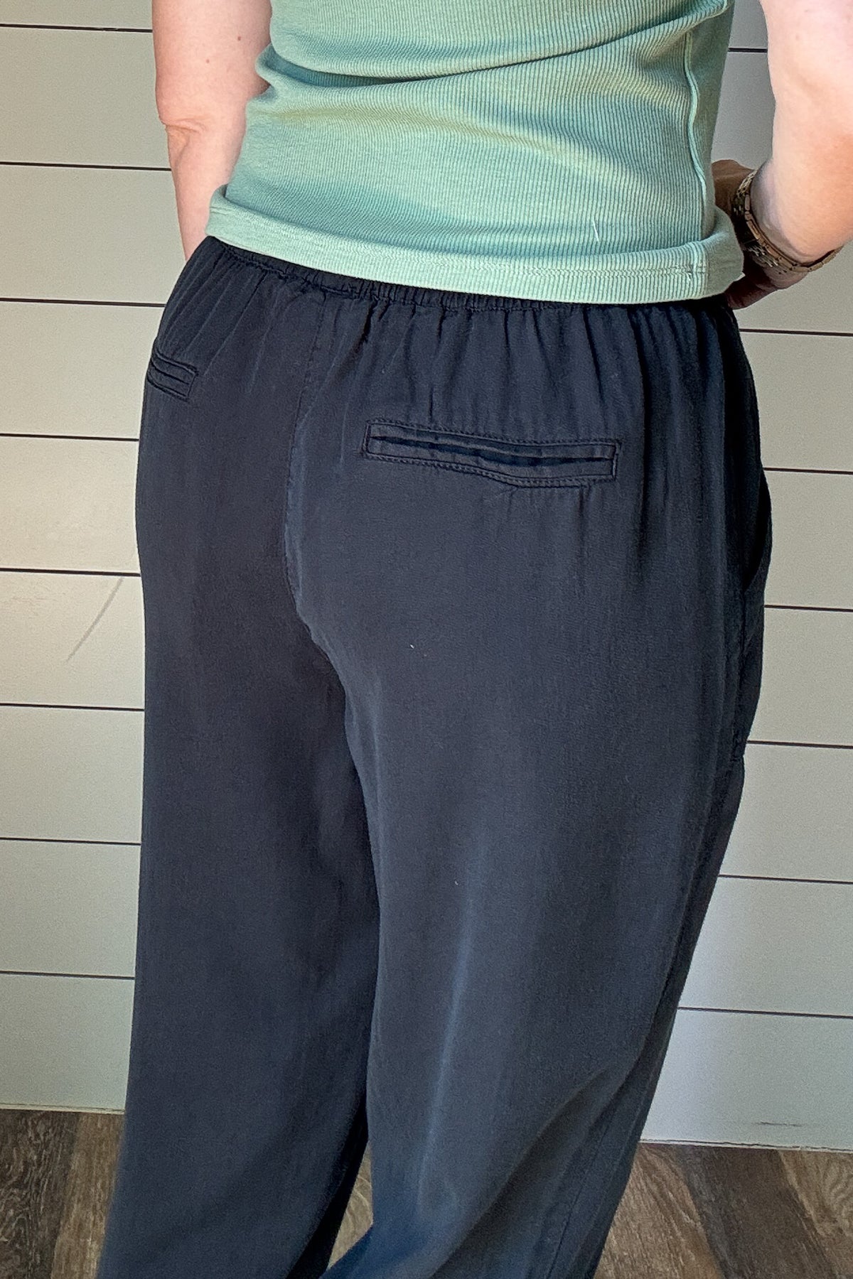 Made for movement, lounging, or anything in between. These black joggers have an easy, relaxed fit with a soft washed feel and drawstring waist for all-day comfort. The cuffed hem and patch pockets keep things laid-back but pulled together. Whether you're running errands or heading to lunch, these joggers are your go-to for everyday style without the effort.