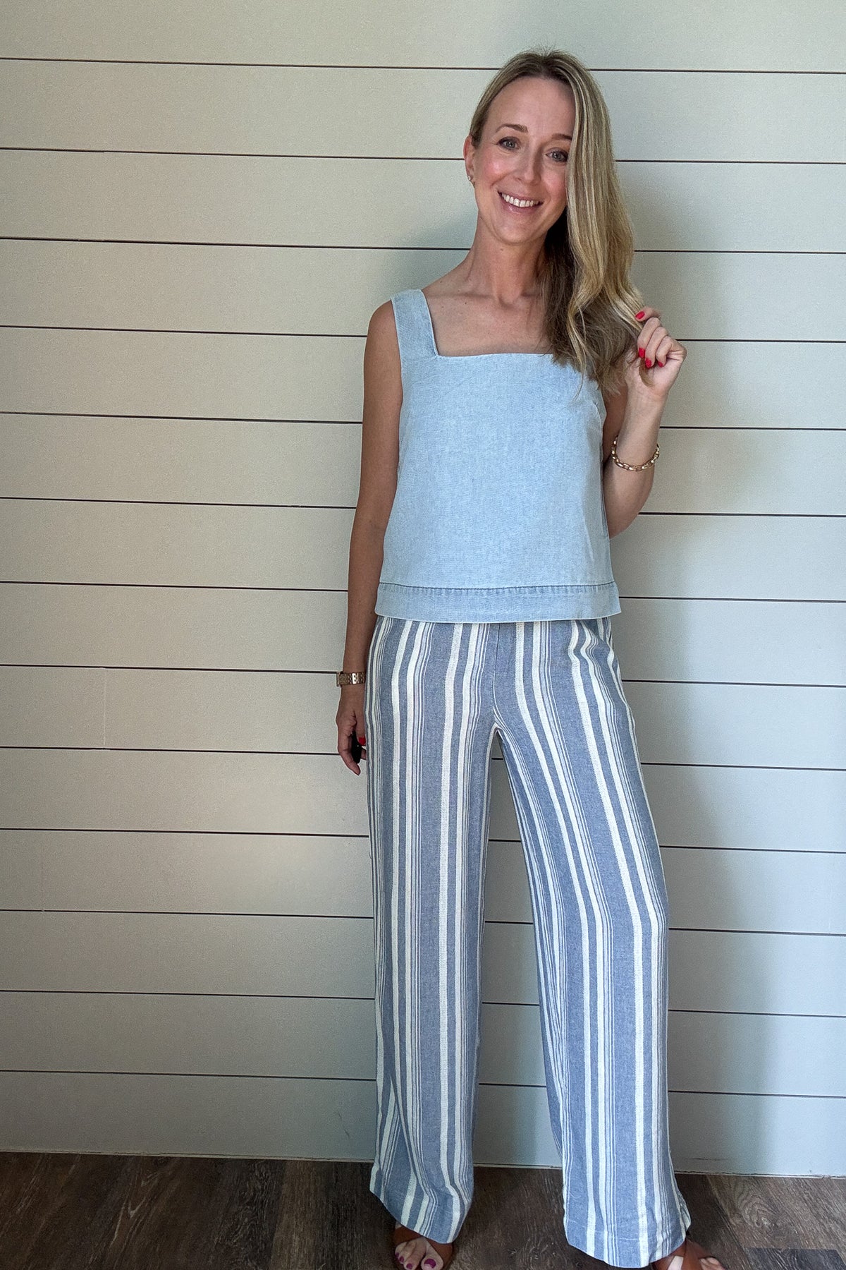 These striped wide leg pants are your go-to for an easy, breezy day. Made from a lightweight fabric, they’re unlined for cool comfort and feature functional front and back pockets. The relaxed fit and vertical stripes keep things flattering and laid back- perfect for travel, errands, or a casual lunch out.