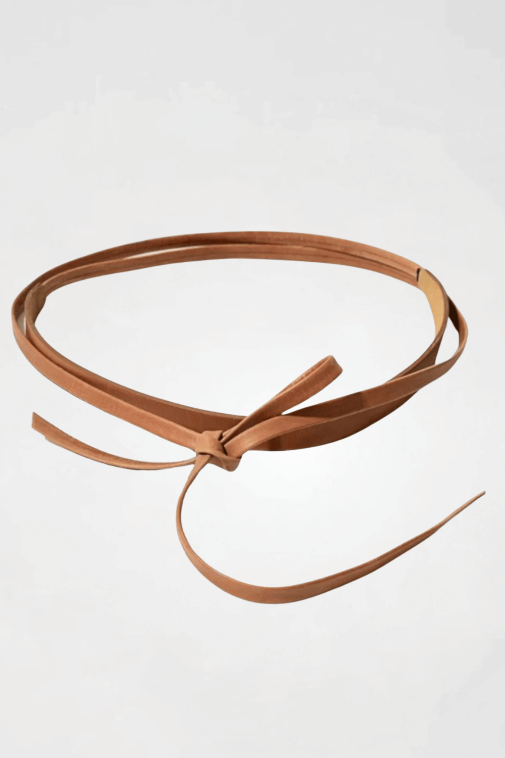 Meet the skinny wrap belt – the next best thing to the classic wrap belt. Handmade with the same versatile design, just in a sleek skinny version. Perfect for covering hemlines and ideal for petite frames, it’s a stylish accessory that works with any outfit.