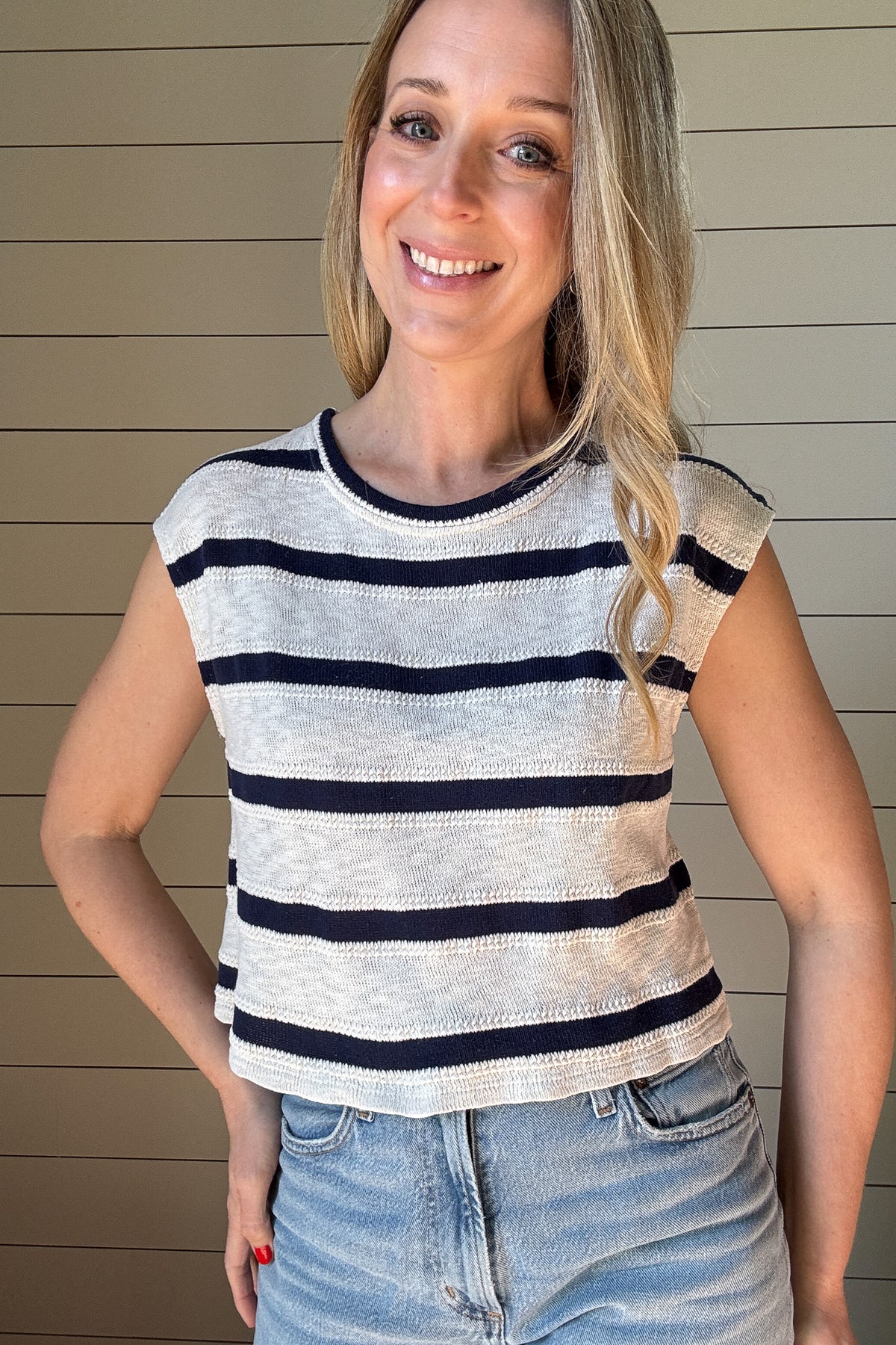Effortlessly elevate your summer wardrobe with our Sleeveless Navy & Cream Texture Knit Striped Top.
Made with a navy and cream textured knit, this top offers a casual yet stylish look.
With its loose fit and sleeveless design, it's the perfect choice for a comfortable and effortlessly chic outfit.