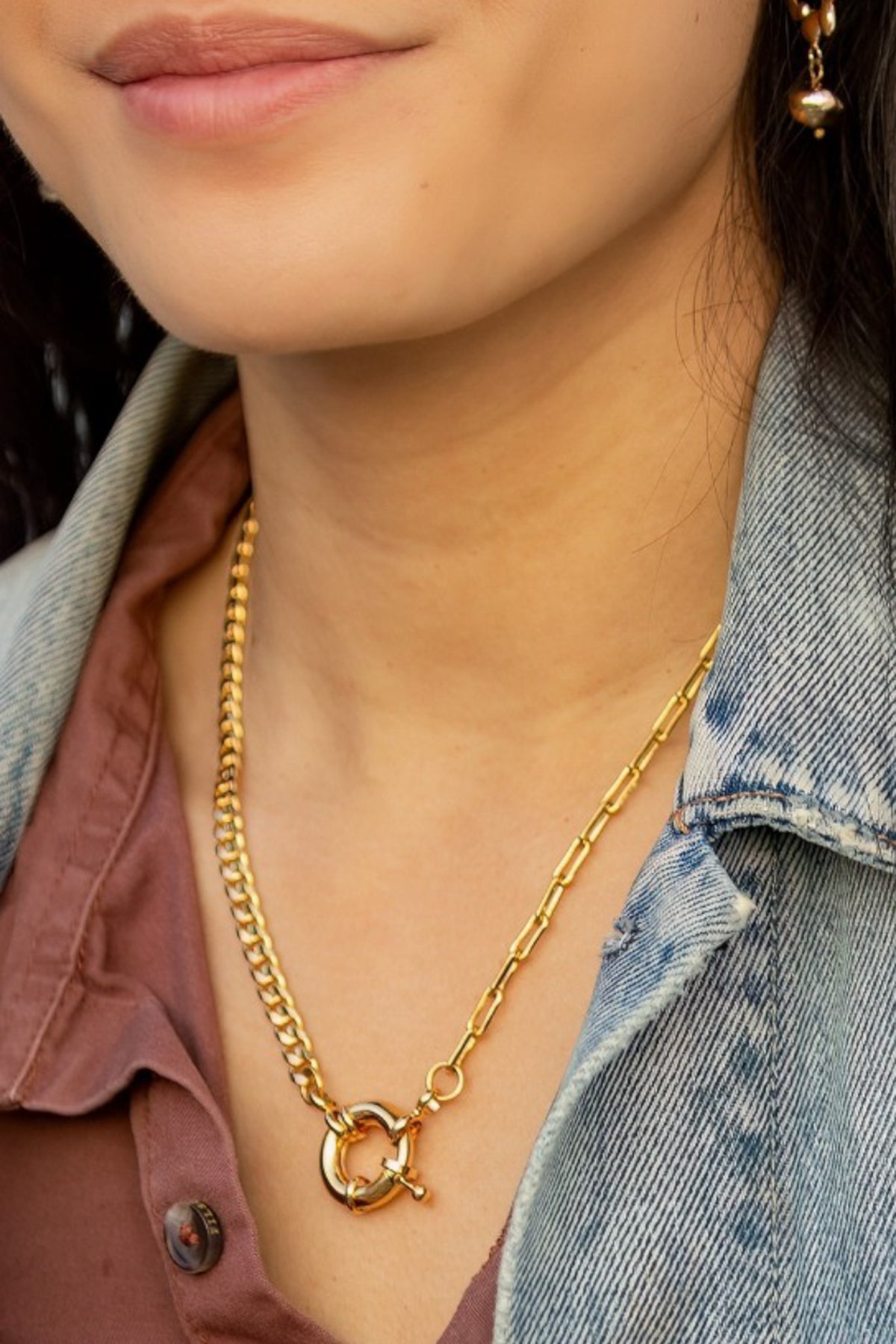 Add some nautical fun to your summer outfits! This necklace is made in the USA & has an adjustable chain.