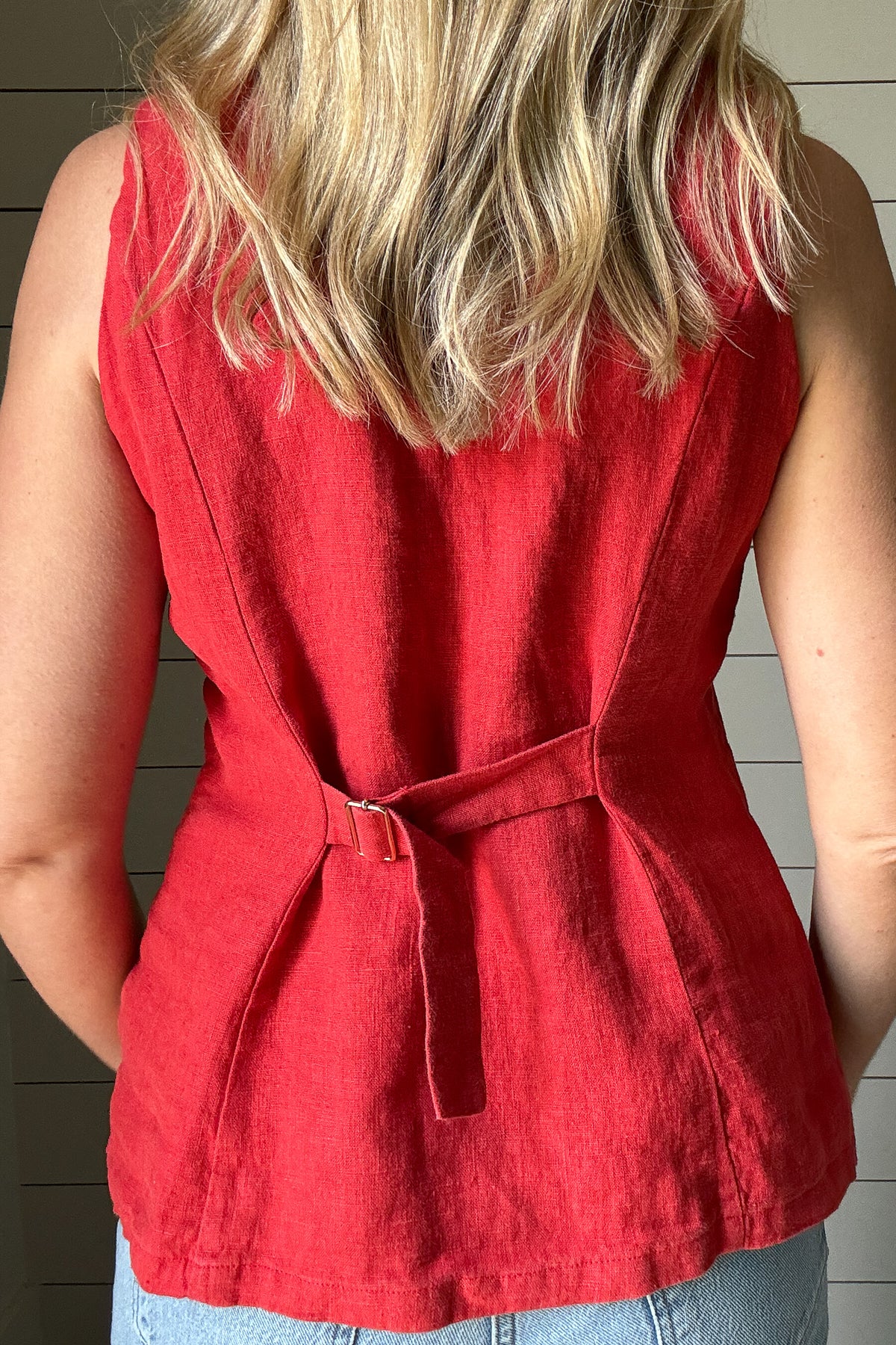 A bold yet easy layering piece, this chili red vest brings structure and effortless style to any look. Lightweight and breathable, it works well on its own or layered over a tee. The tailored cut flatters without feeling too stiff, and the rich color adds a fun pop to your wardrobe.