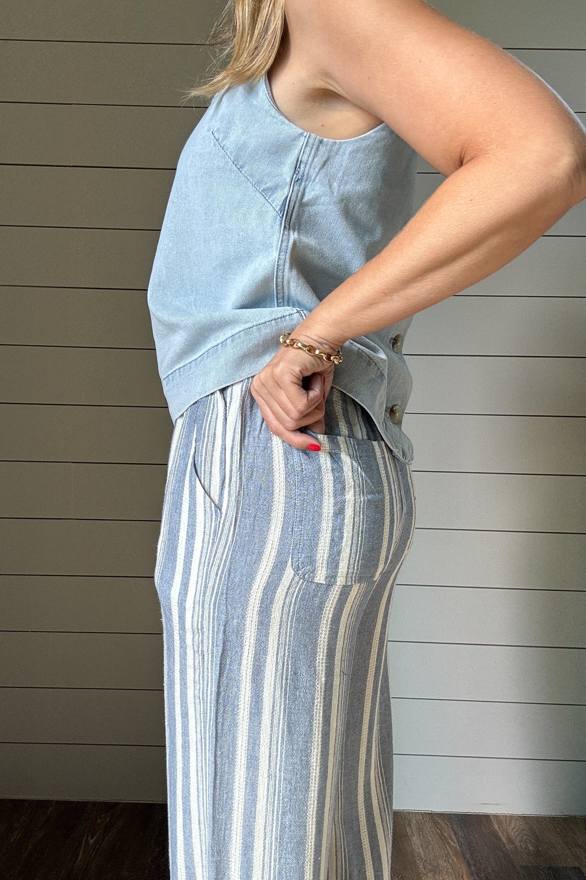 These striped wide leg pants are your go-to for an easy, breezy day. Made from a lightweight fabric, they’re unlined for cool comfort and feature functional front and back pockets. The relaxed fit and vertical stripes keep things flattering and laid back- perfect for travel, errands, or a casual lunch out.