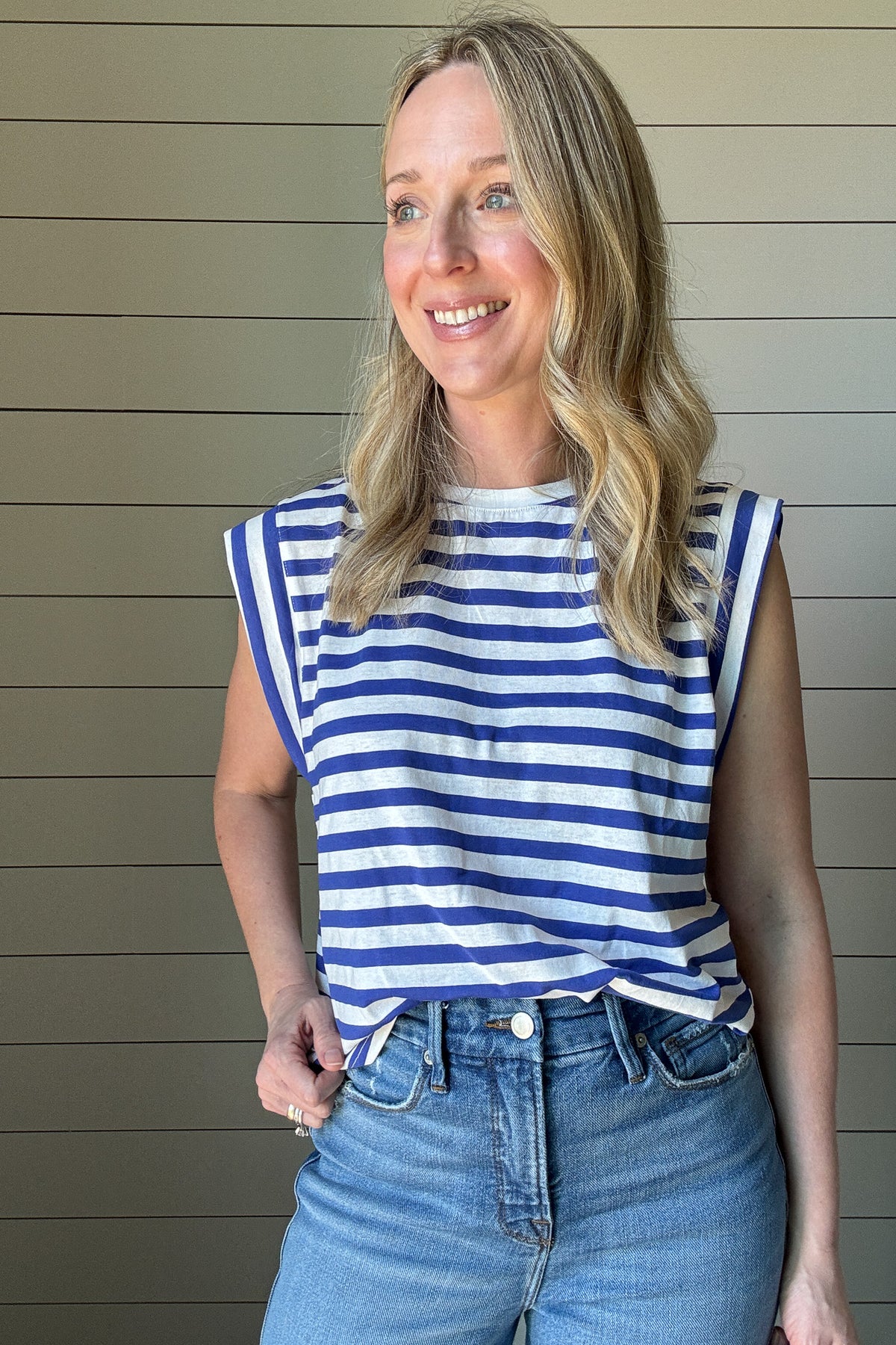 This cotton striped top is a fresh twist on a classic. Made from soft, breathable cotton, it features blue and white horizontal stripes on the bodice for a timeless look, while the shoulders switch it up with vertical stripes for a subtle contrast. The relaxed fit keeps things comfortable, and the simple crew neckline makes it easy to style.