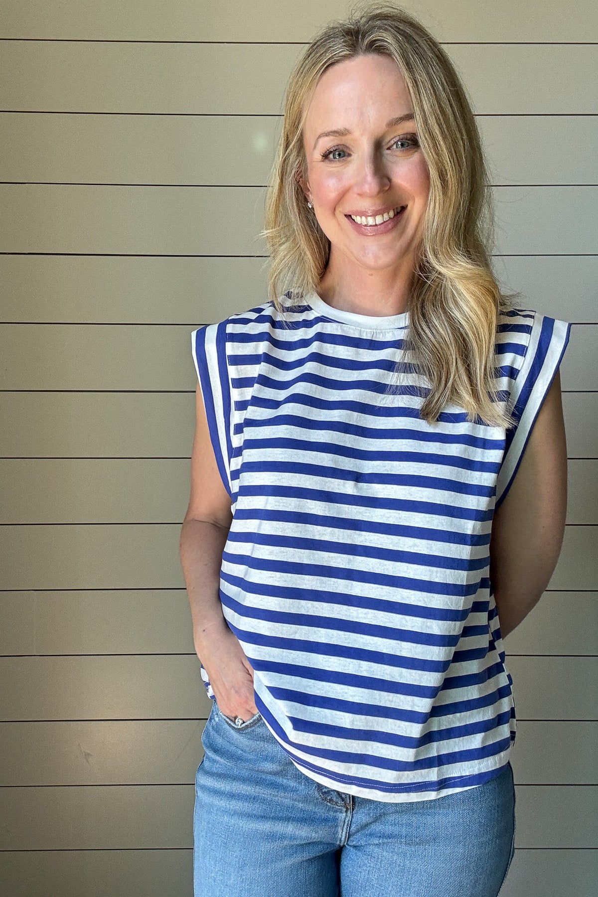 This cotton striped top is a fresh twist on a classic. Made from soft, breathable cotton, it features blue and white horizontal stripes on the bodice for a timeless look, while the shoulders switch it up with vertical stripes for a subtle contrast. The relaxed fit keeps things comfortable, and the simple crew neckline makes it easy to style.