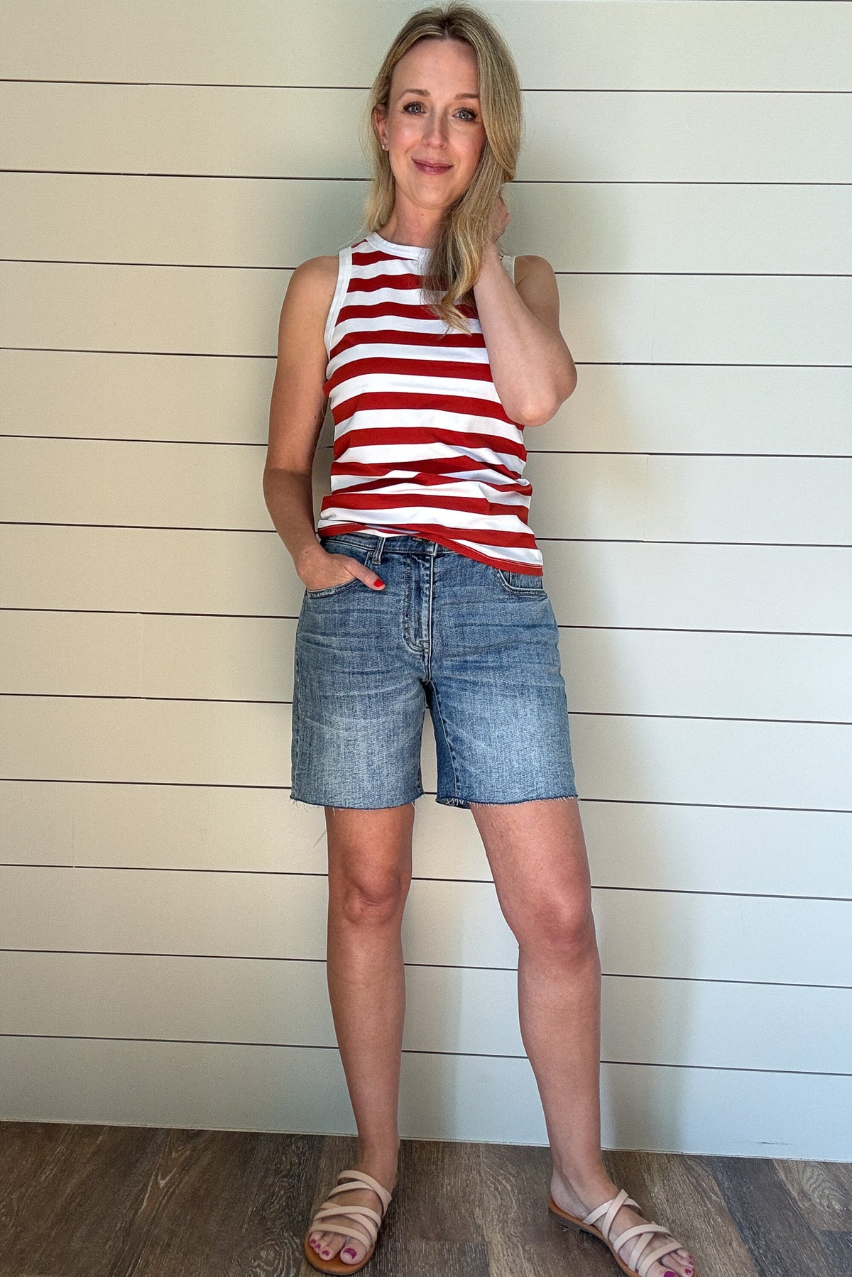 Meet your new favorite denim short! With a 6.5” raw hem that can be rolled for a customized length, these shorts offer effortless versatility. Designed with a straight cut that fits comfortably in the thigh—no clinging here—while gently tapering at the waist for a flattering fit. Perfect for the mom who wants a modern, stylish short without the “mom short” feel. Dress them up or down for an easy, go-to summer look!