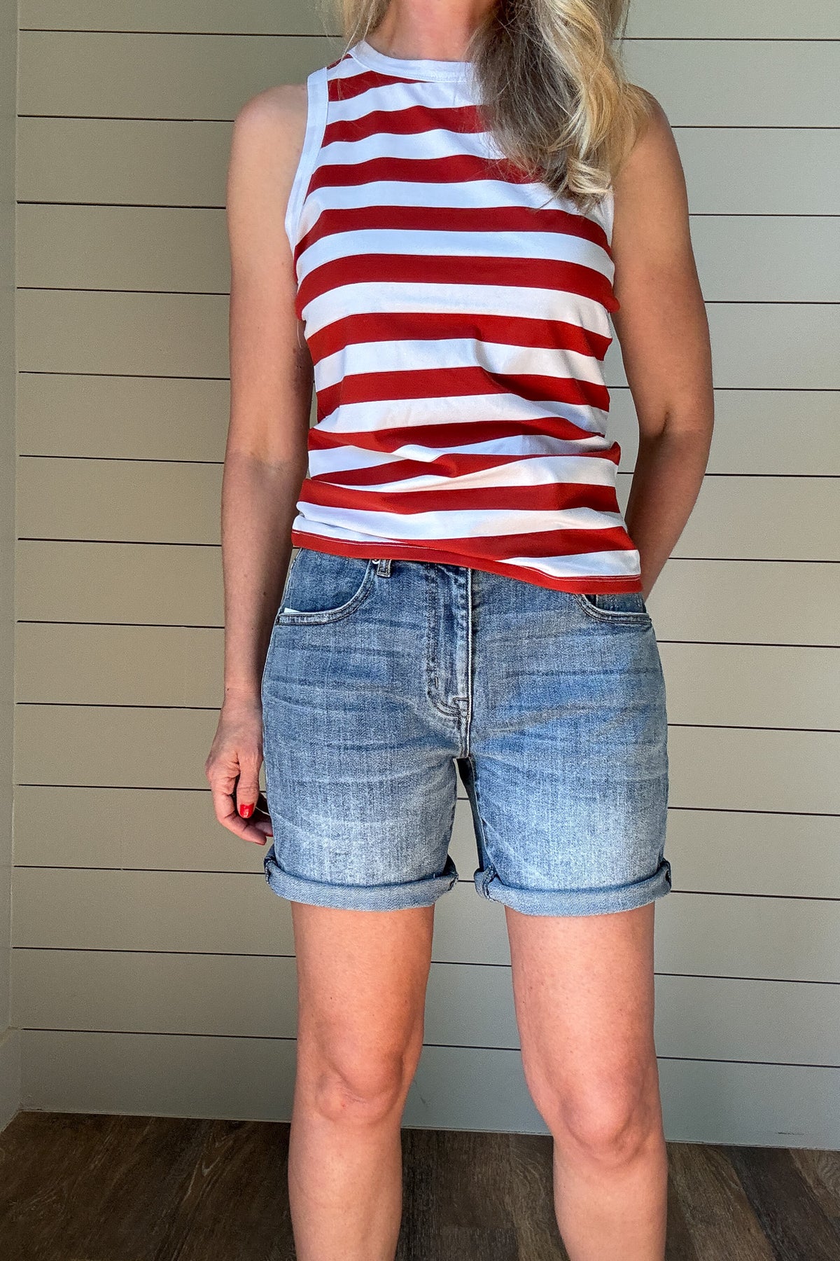 Meet your new favorite denim short! With a 6.5” raw hem that can be rolled for a customized length, these shorts offer effortless versatility. Designed with a straight cut that fits comfortably in the thigh—no clinging here—while gently tapering at the waist for a flattering fit. Perfect for the mom who wants a modern, stylish short without the “mom short” feel. Dress them up or down for an easy, go-to summer look!