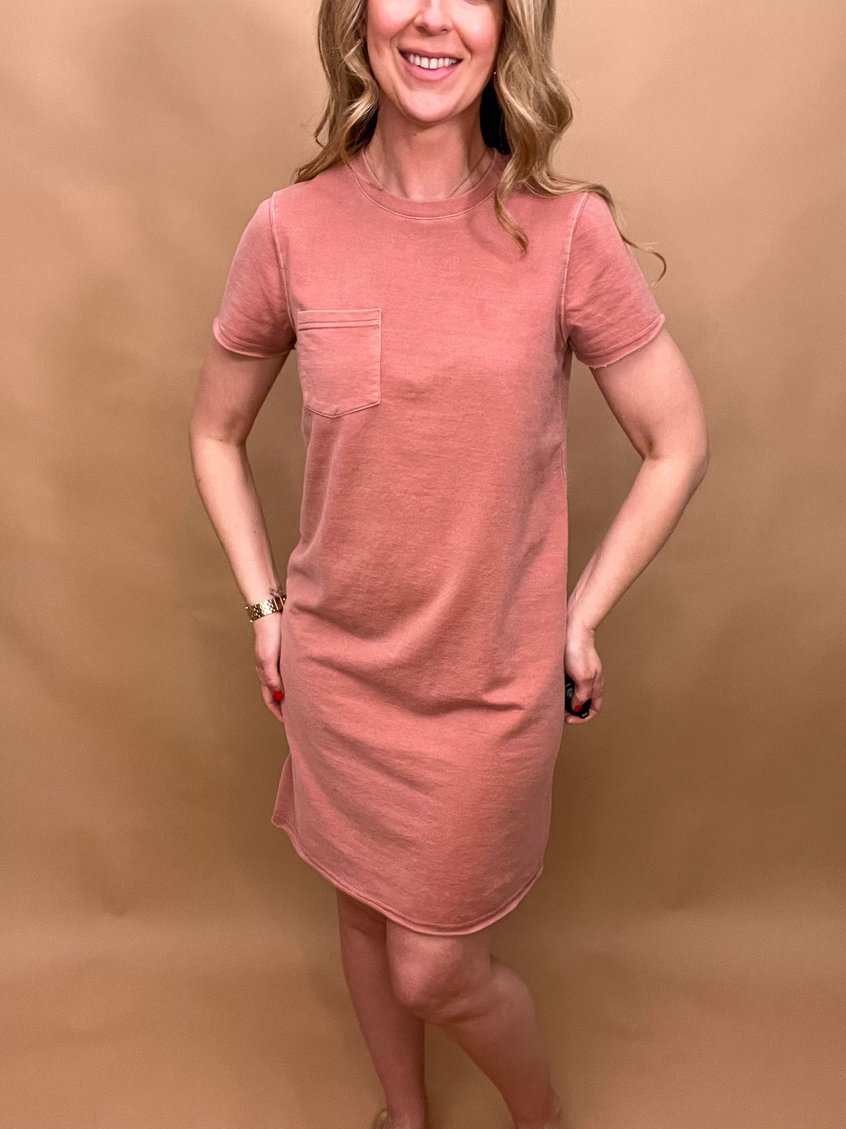 Pocket tee dress with rolled sleeves, this cutie hits above the knee. Elevate your summer wardrobe with the Coming up Roses Tee Shirt Dress. Designed with rolled sleeves and just above the knee length, this dress is the perfect blend of comfort and style. Made with high-quality fabric, you'll feel confident and chic as you go about your day.