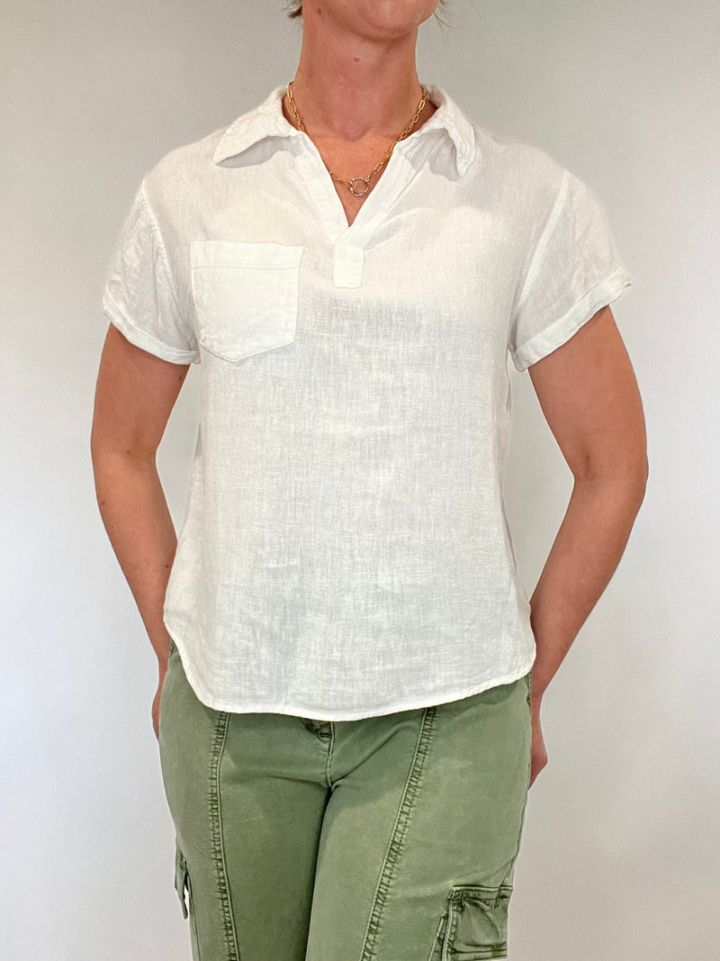 Linen blend perfection. This is your go to everything white top; layer it under a jacket, pair with pants or shorts, dress it up or dress it down but know that however you style this top you will look and feel put together.