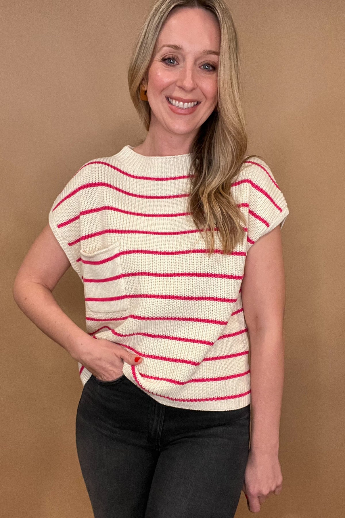 Effortlessly add a pop of color to your wardrobe with our&nbsp;Pink Stripes&nbsp;Sweater Top! This hot pink and white cap sleeve sweater is made from 100% cotton for ultimate comfort. With a waist-length hem, chest pocket, and chunky knit, this top is both fun and stylish!