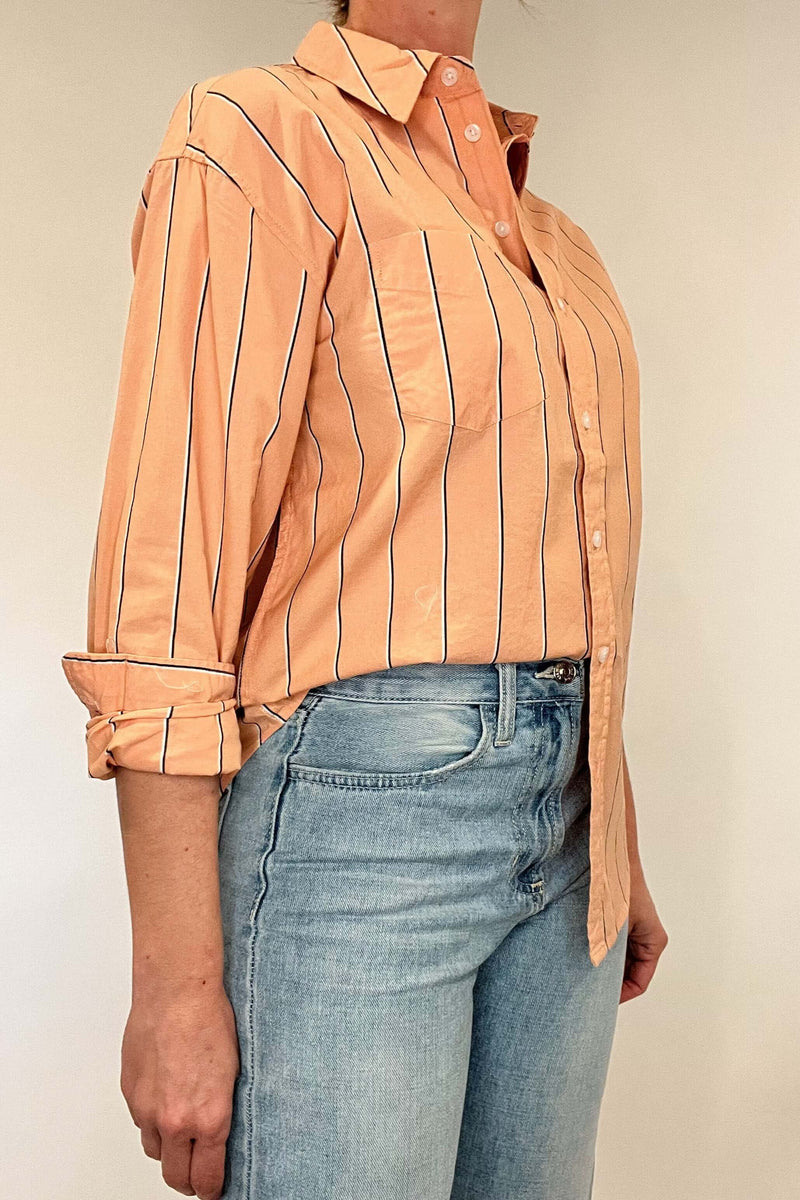 Indulge in effortless elegance with our Just Peachy Striped Shirt. Crafted from 100% cotton, this classic cut shirt features delicate peach tones and black and white pin stripes for a timeless yet modern look. Complete with a single chest pocket, it's the perfect blend of luxury and style.