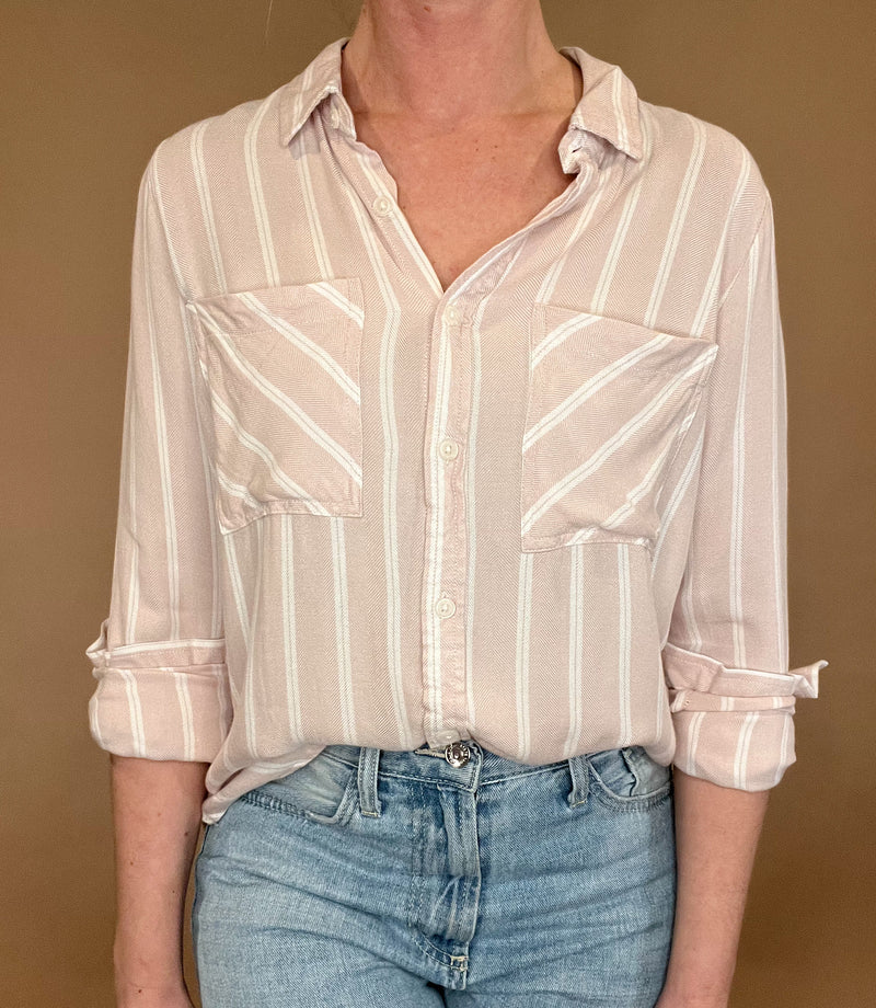 Introducing the Bestie Shirt in Blush, your new companion for the spring and summer season. Made with a luxurious lyocell blend, this stylish striped shirt is versatile enough to pair with any casual denim and sandals. Let it be your go-to piece for effortless fashion.