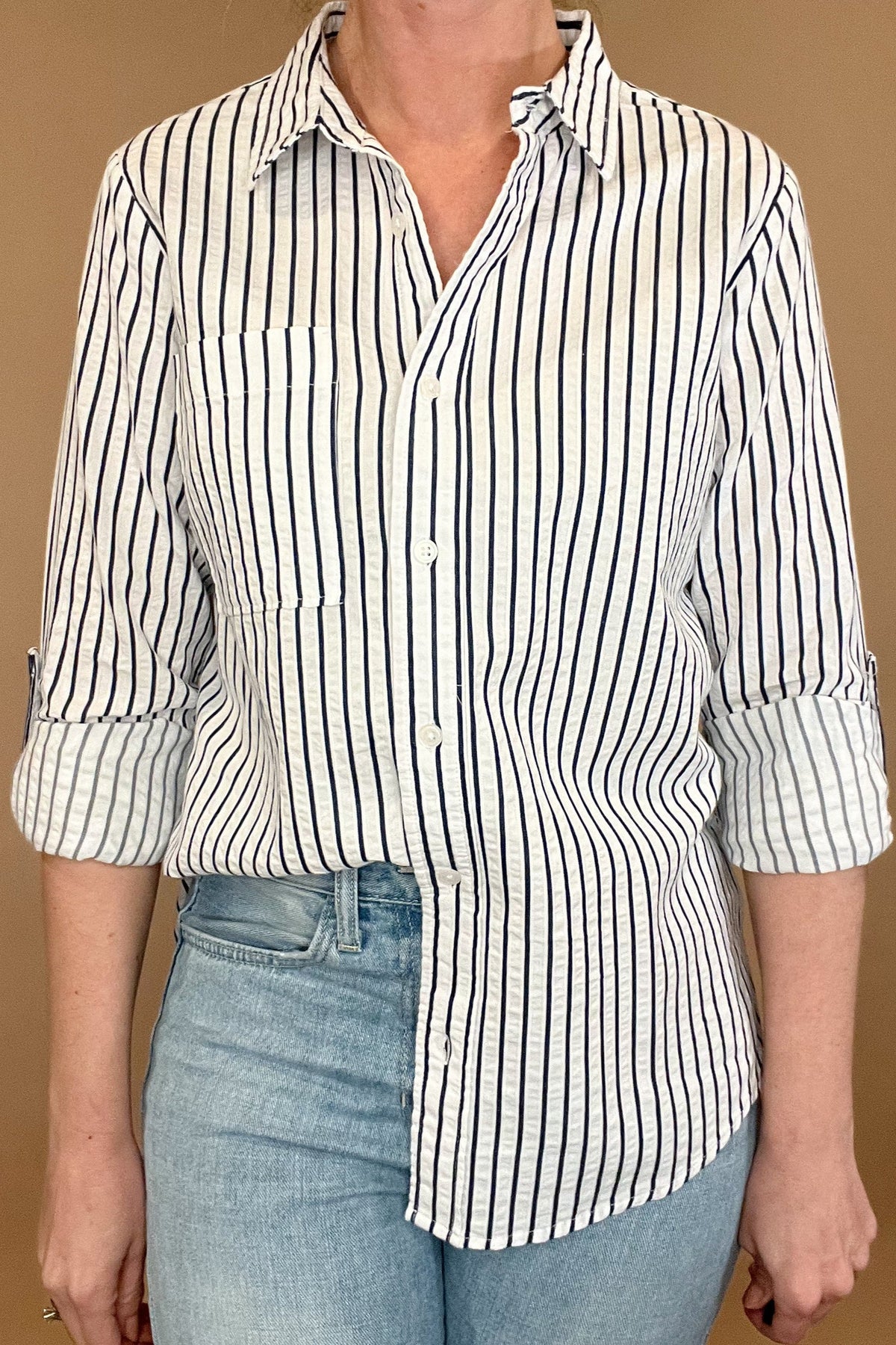 The Marina top is effortlessly beautiful with textured stripes, a split hem &amp; a single chest pocket. Made from 100% cotton, this stylish striped shirt is versatile enough to pair with any casual denim and sandals or work wear. Let it be your go-to piece for effortless fashion.