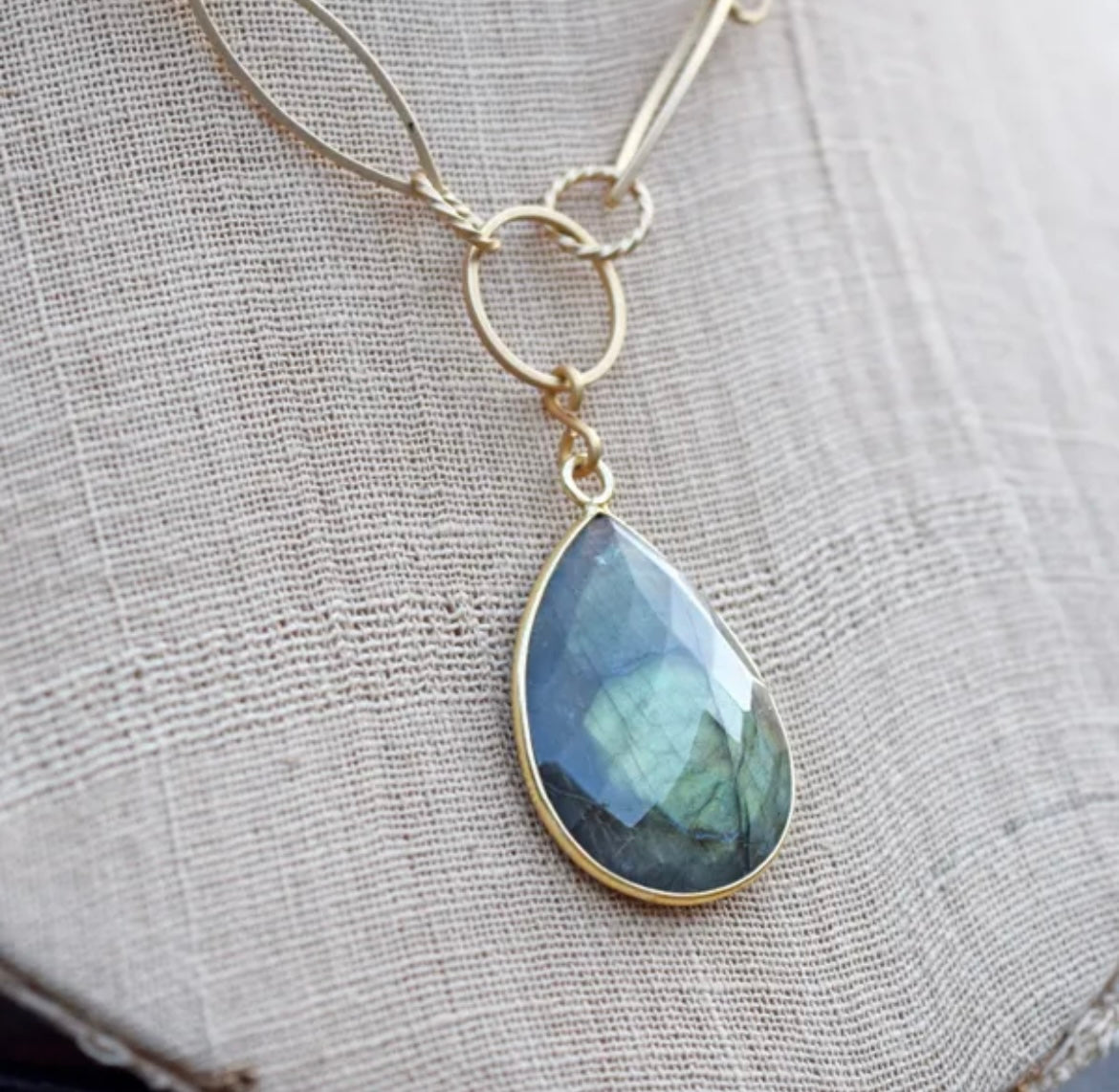 <p><span>This luxurious necklace flaunts a Labradorite gemstone framed by a Gold Vermeil bezel, delicately suspended from a shimmering Matte Gold chain with a secure Matte Gold lobster clasp enclosure; measuring approximately 17 inches in length.</span></p> <p>Hand made in the USA</p>