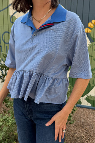 Blue VonVie Bunny Polo made from an upcycled vintage polo with contrasting collar, striped trim, and gathered ruffle hem.