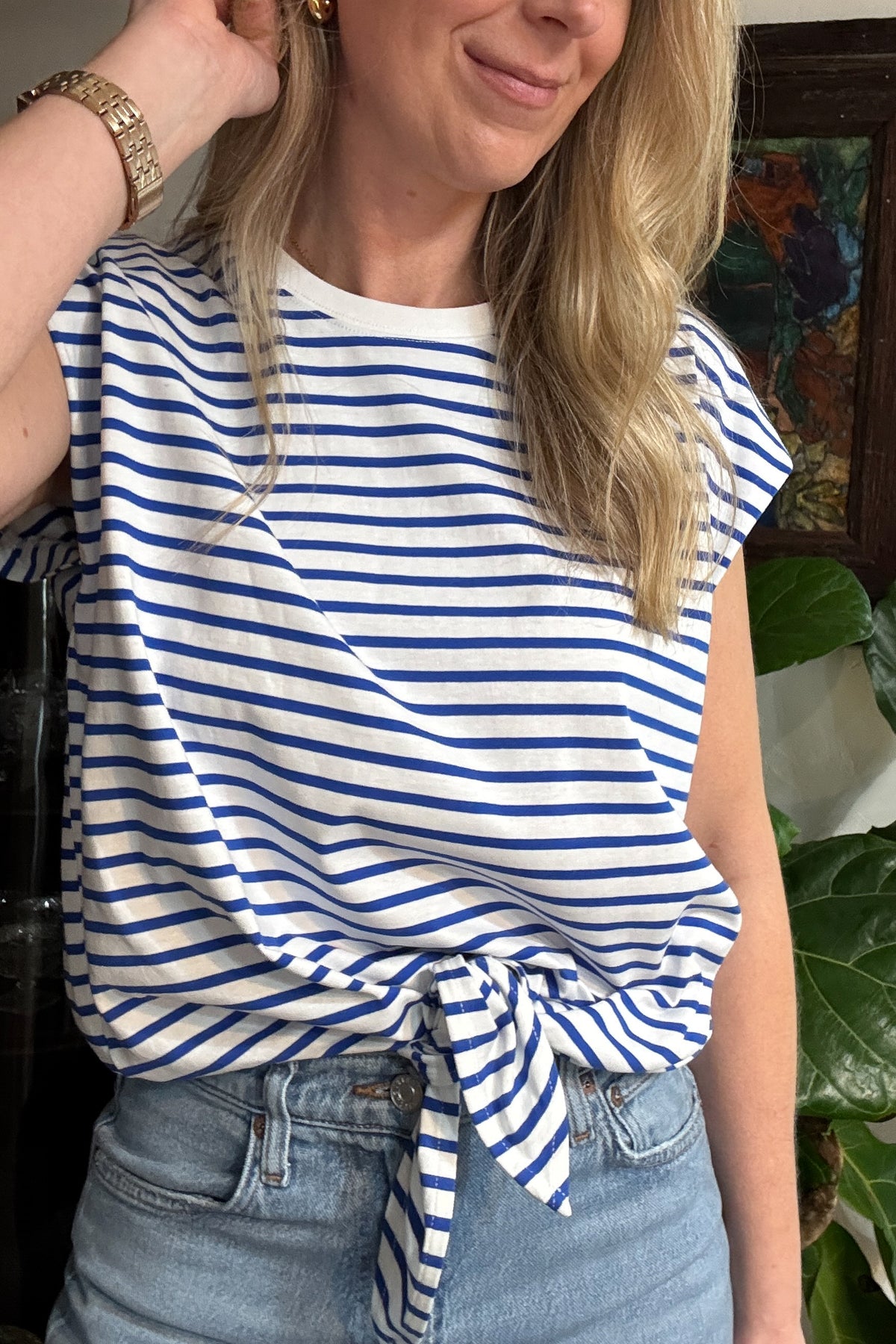 You're going to love this versatile top! Designed to be worn with a front tie or tucked in, this 100% cotton cap sleeve tee shirt is roomy, flattering and fun. The bright blue and white fabric is not see through and holds its shape beautifully. It is made to be worn on repeat. Brighten up your day with this top! Ships quickly from our warehouse in Texas.&nbsp;