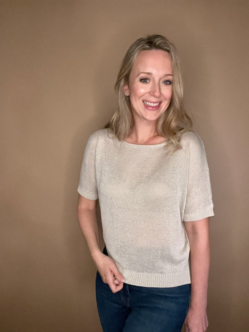 Delicate and layer-able, this featherweight short sleeve knit top&nbsp;offers luxurious comfort. The fine-knit fabric in fog grey has an ethereal feel, making it the perfect piece to add timeless elegance to your wardrobe.