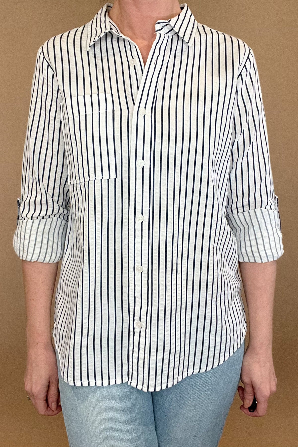 The Marina top is effortlessly beautiful with textured stripes, a split hem &amp; a single chest pocket. Made from 100% cotton, this stylish striped shirt is versatile enough to pair with any casual denim and sandals or work wear. Let it be your go-to piece for effortless fashion.