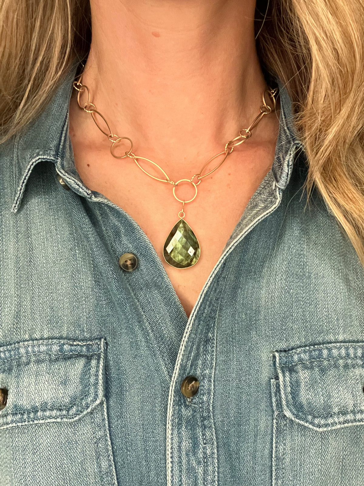 <p><span>This luxurious necklace flaunts a Labradorite gemstone framed by a Gold Vermeil bezel, delicately suspended from a shimmering Matte Gold chain with a secure Matte Gold lobster clasp enclosure; measuring approximately 17 inches in length.</span></p> <p>Hand made in the USA</p>