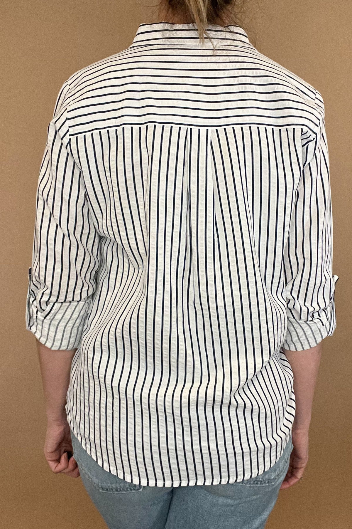 The Marina top is effortlessly beautiful with textured stripes, a split hem &amp; a single chest pocket. Made from 100% cotton, this stylish striped shirt is versatile enough to pair with any casual denim and sandals or work wear. Let it be your go-to piece for effortless fashion.