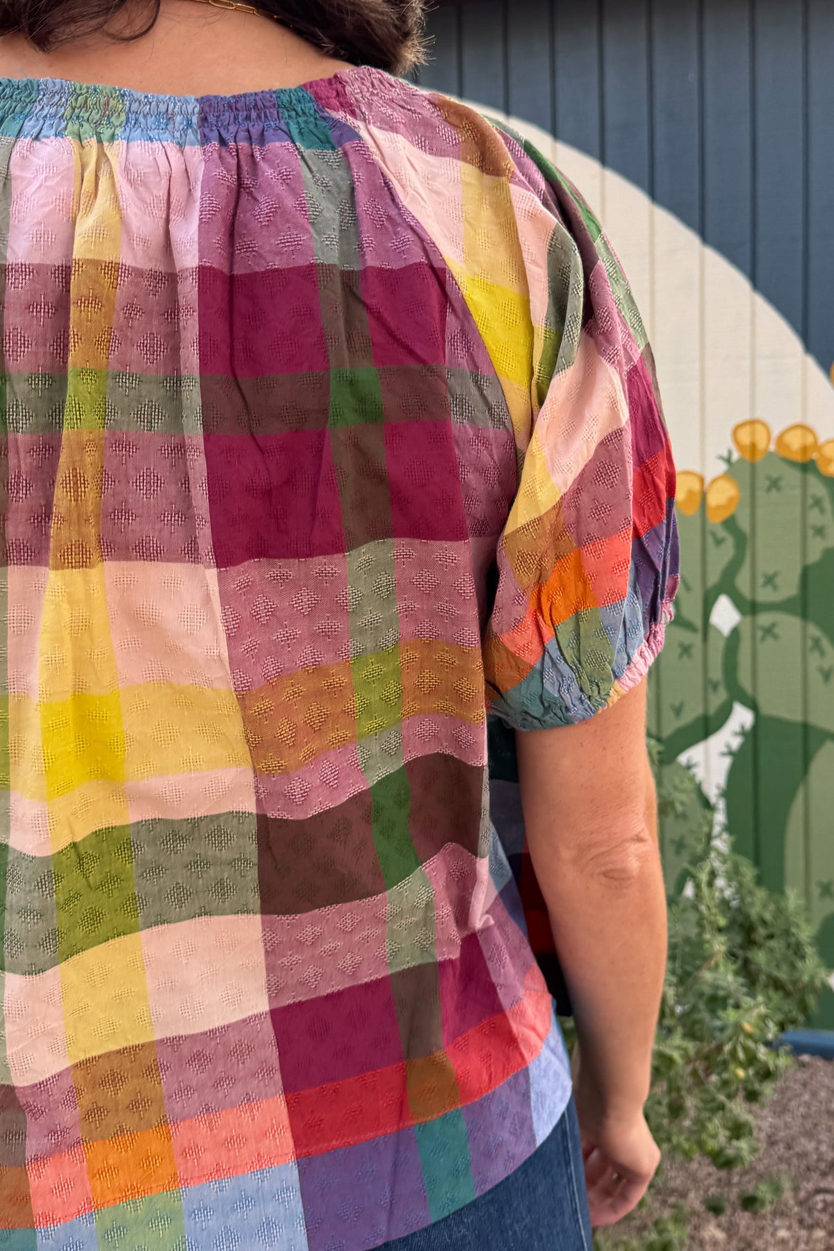 Women’s plaid button-front top in textured cotton dobby with a softly gathered neckline and easy silhouette.