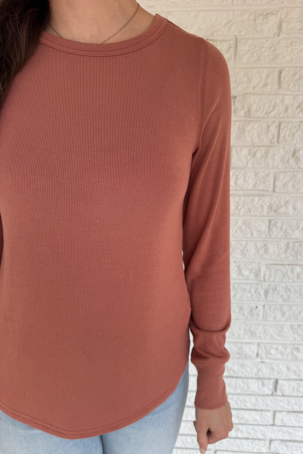 Soft, simple, and effortlessly flattering — this long sleeve top is your new everyday go-to. Made from luxe micro modal with a hint of stretch, it drapes beautifully and feels silky smooth against the skin. Perfect for layering or wearing solo with your favorite denim.