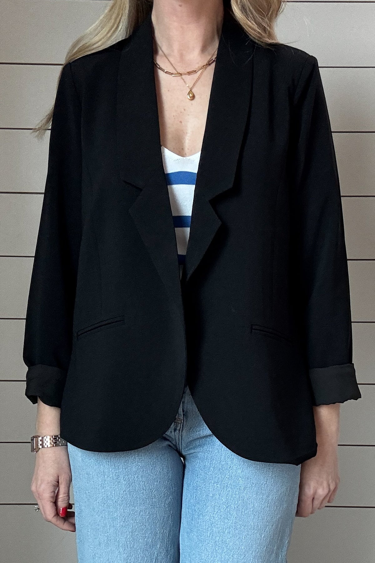 Elevate your wardrobe with our essential black blazer. Designed for effortless style, this piece features a sleek, open-front silhouette that’s easy to wear and endlessly versatile. The clean lines give it a modern, polished look, while the fully lined interior ensures comfort all day long. 