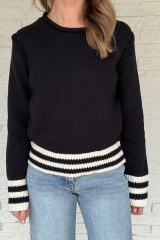 This classic striped knit is the kind of sweater you’ll wear all season long. Made from a heavy 100% cotton knit, it has a cozy, substantial feel without being bulky. The contrast stripes at the hem and cuffs add a clean, sporty touch that keeps it timeless and easy. Women's fashion boutique Blanco Texas Johnson City Texas