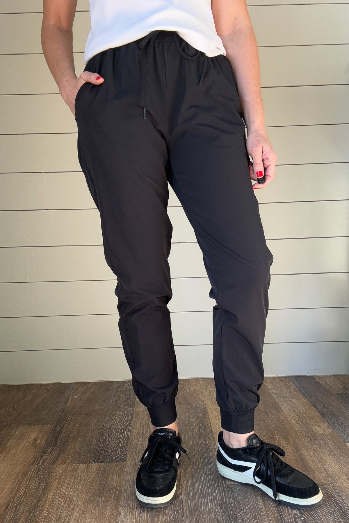 Jog into your days off in style with this luxuriously soft, effortlessly comfortable Black Athleisure Joggers..

It's elastic tie waist will ensure you look chic and comfortable no matter where your day takes you.

Boasting pockets at the hips, this jogger is perfect for a day of relaxing or running errands.