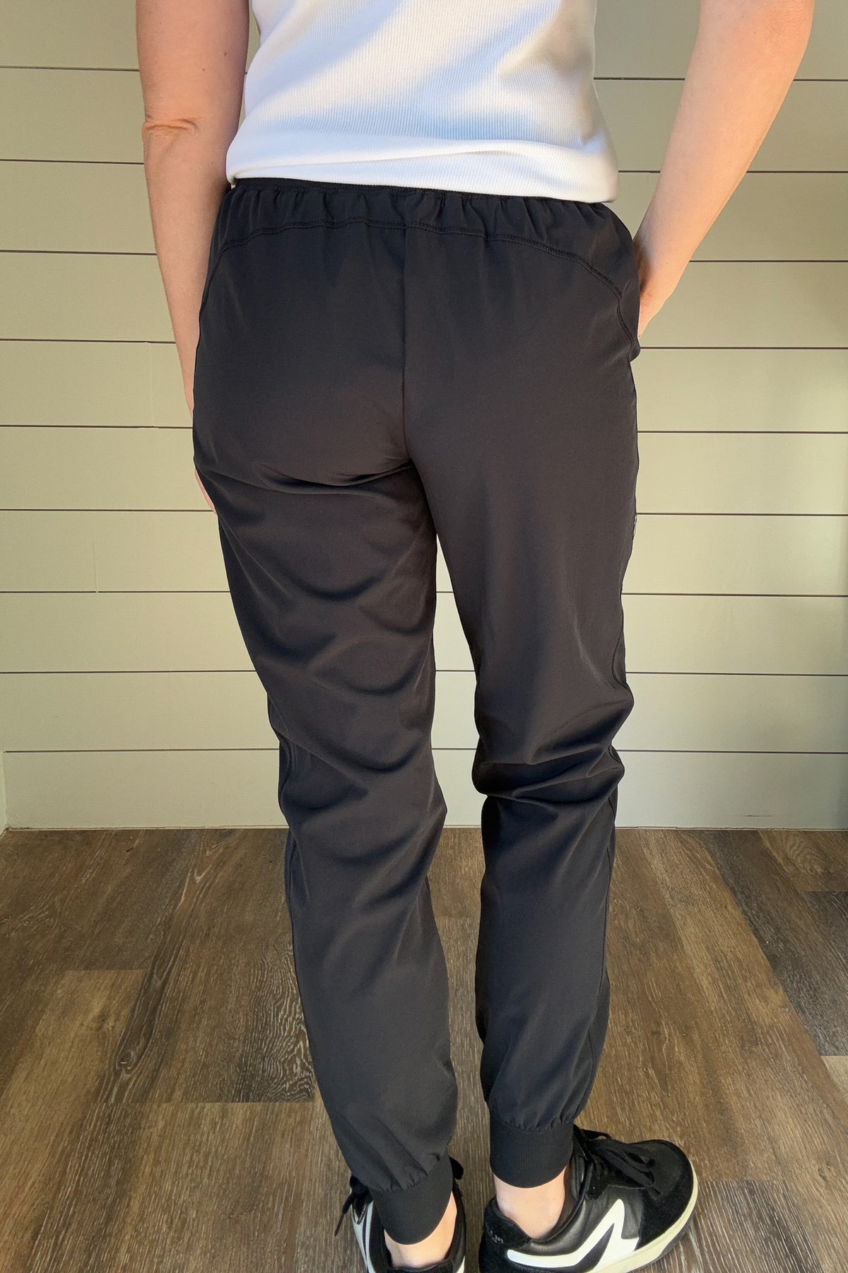 Jog into your days off in style with this luxuriously soft, effortlessly comfortable Black Athleisure Joggers..

It's elastic tie waist will ensure you look chic and comfortable no matter where your day takes you.

Boasting pockets at the hips, this jogger is perfect for a day of relaxing or running errands.