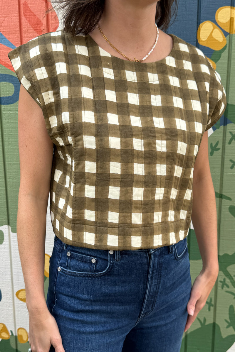 Women’s cropped gingham top in soft neutral quilted cotton with structured shape and back button closure.