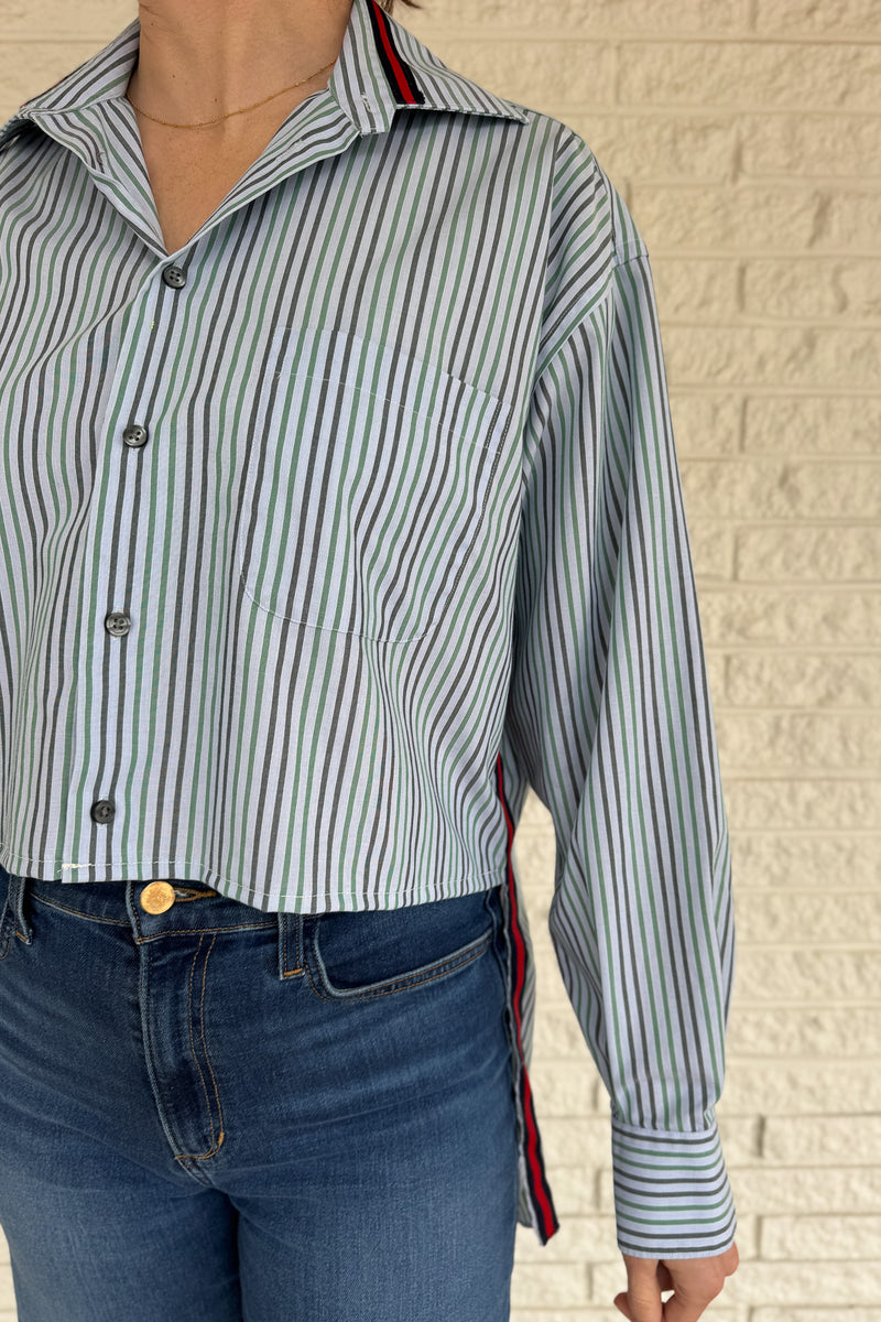 The modern Stormy button-down is designed to move with you for an easy, elevated feel. The cropped front flows into a longer back for a flattering high-low shape that adds interest to a classic style. Finished details give this piece a polished look that works dressed up or casual. Women's fashion boutique Blanco Texas