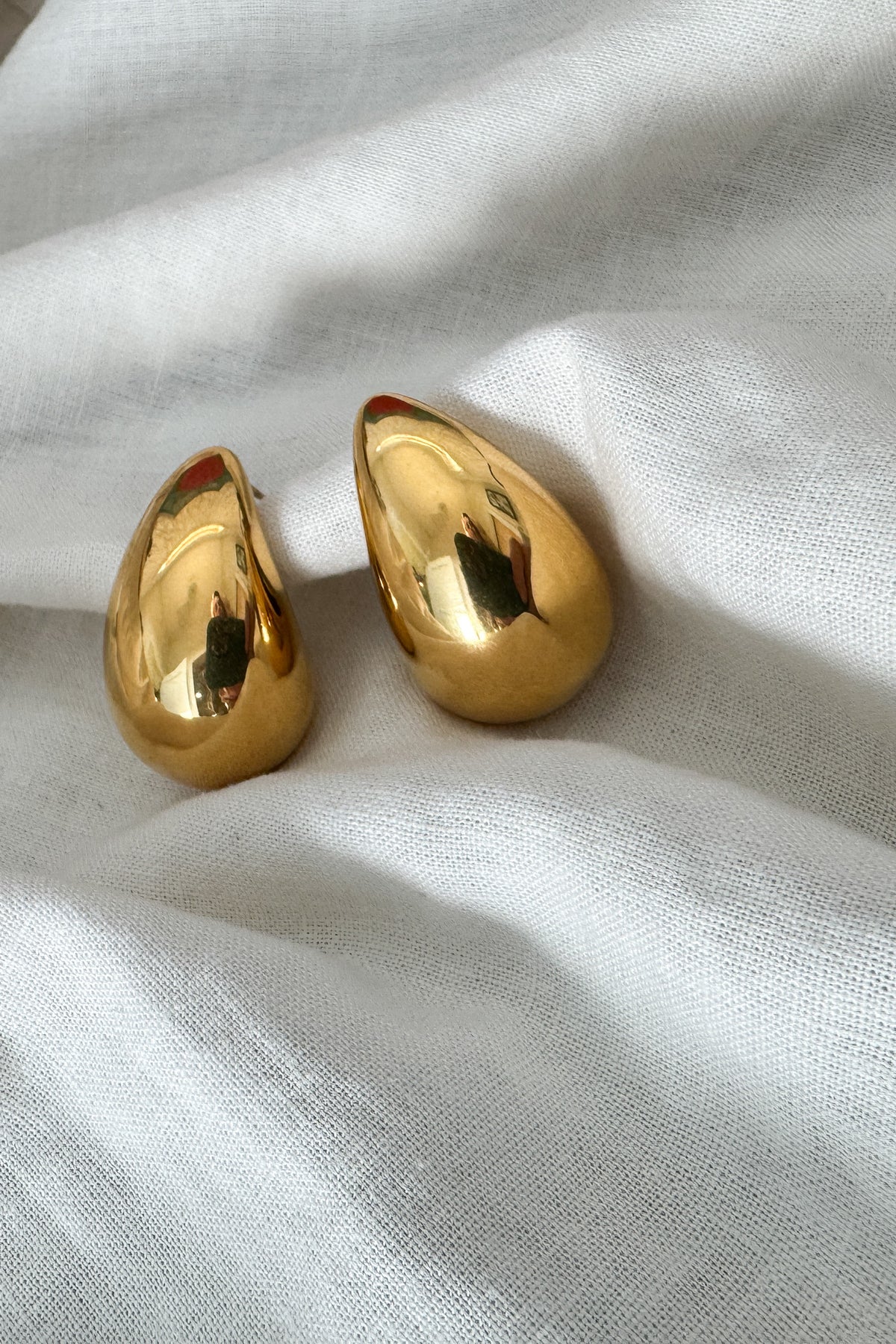 Our Aura Earrings have a hollow center which makes them lightweight. These earrings were made to shine.

18k gold plated
plated over stainless steel
water proof
3.25cm x 1.90cm
nickel / lead free
made with materials ethically sourced