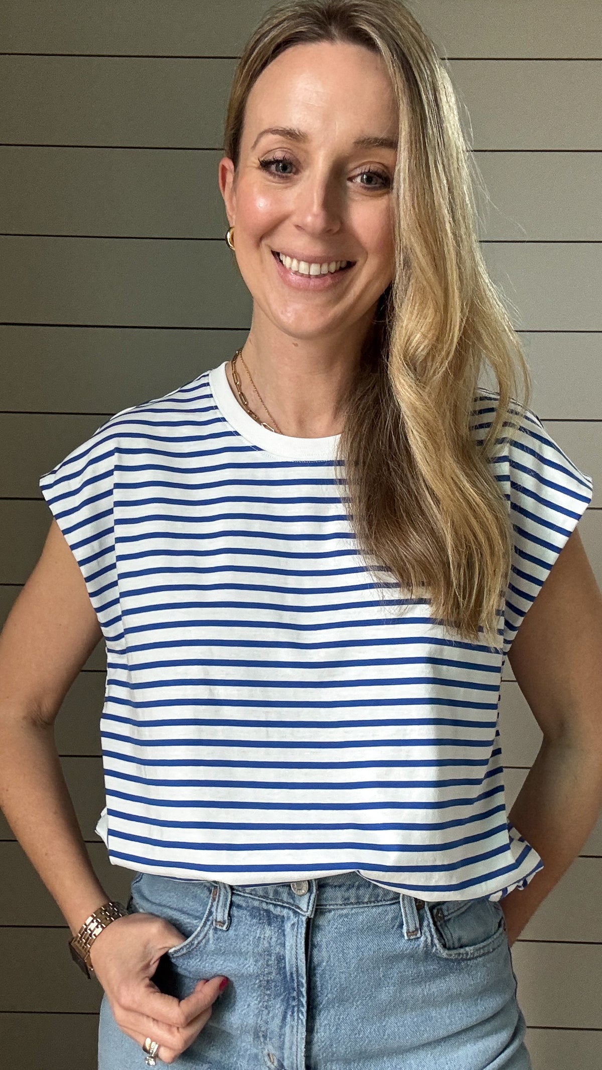 You're going to love this versatile top! Designed to be worn with a front tie or tucked in, this 100% cotton cap sleeve tee shirt is roomy, flattering and fun. The bright blue and white fabric is not see through and holds its shape beautifully. It is made to be worn on repeat. Brighten up your day with this top! Ships quickly from our warehouse in Texas.&nbsp;