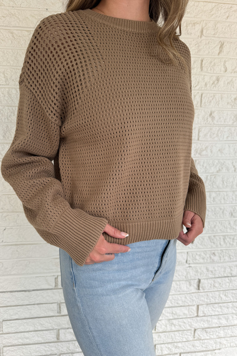 Effortless and timeless, this 100% cotton open knit sweater is the perfect layering piece for effortless clothing and everyday wear. Designed with a relaxed fit and breathable texture, it’s lightweight yet cozy — ideal for transitioning seasons or throwing on with denim for an easy, polished look.