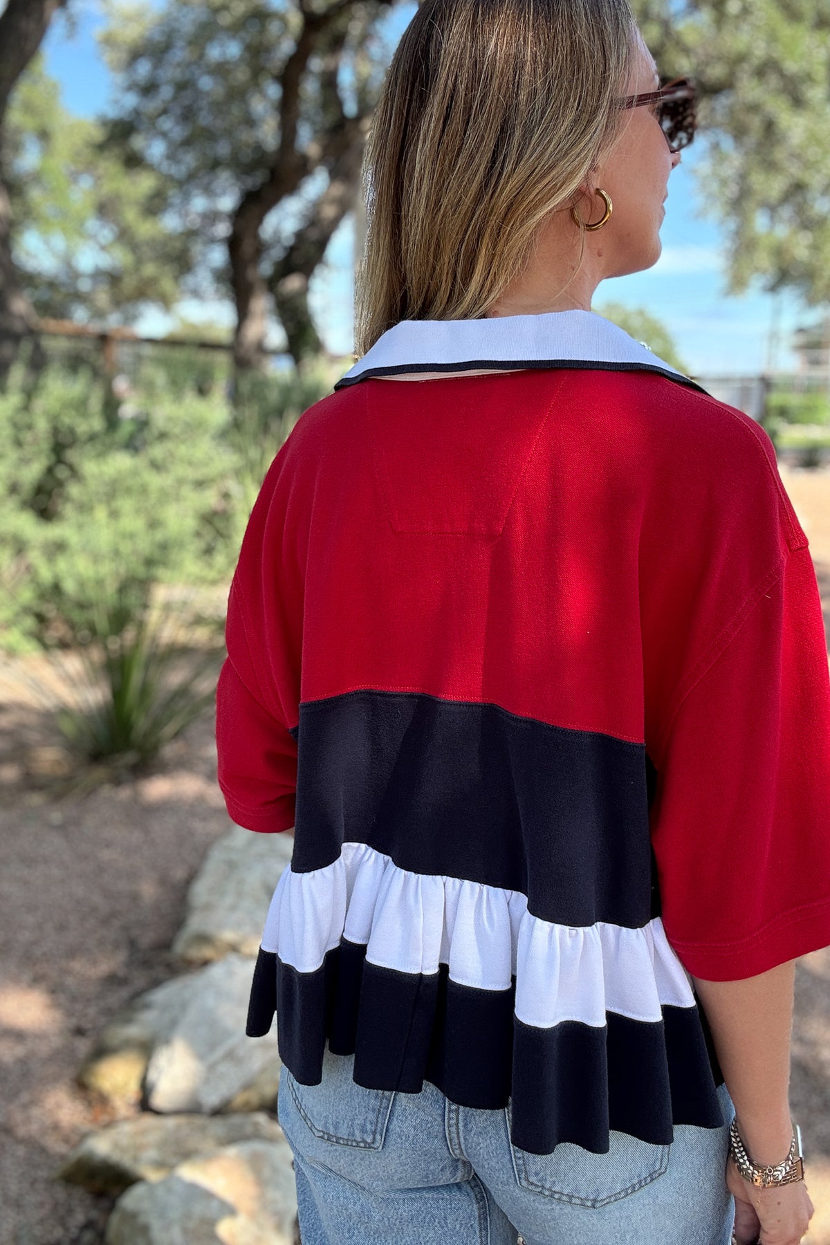   VonVie Bunny Polo, reworked polo shirt, upcycled women’s top, one of a kind women’s clothing, made in USA fashion, sustainable women’s fashion, reclaimed clothing, sporty feminine top, cropped polo top, ruffle hem top, effortless style, women’s clothing boutique, Cotton and Cashmere, Blanco Texas boutique, women’s clothing near me, ethical fashion, unique women’s tops, sustainable boutique clothing  