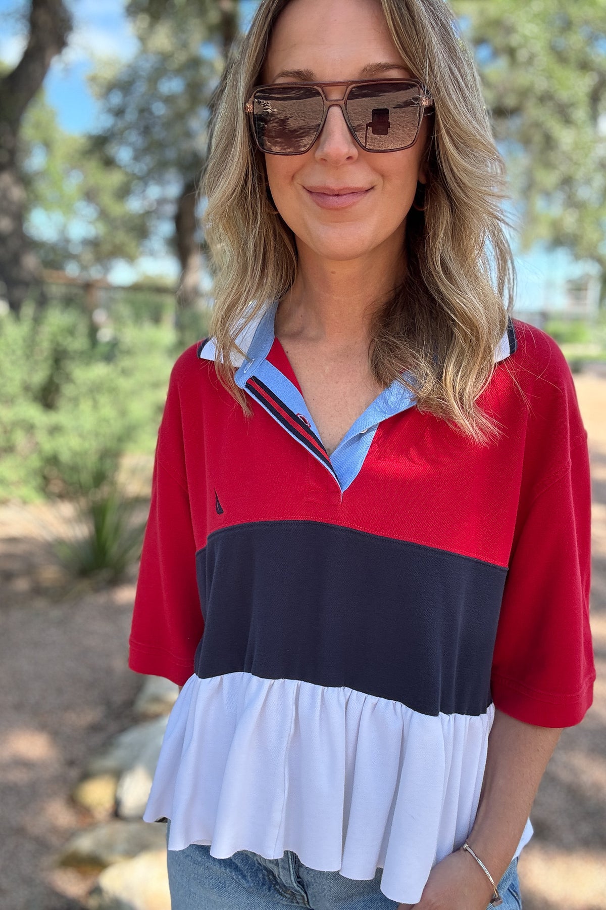   VonVie Bunny Polo, reworked polo shirt, upcycled women’s top, one of a kind women’s clothing, made in USA fashion, sustainable women’s fashion, reclaimed clothing, sporty feminine top, cropped polo top, ruffle hem top, effortless style, women’s clothing boutique, Cotton and Cashmere, Blanco Texas boutique, women’s clothing near me, ethical fashion, unique women’s tops, sustainable boutique clothing  