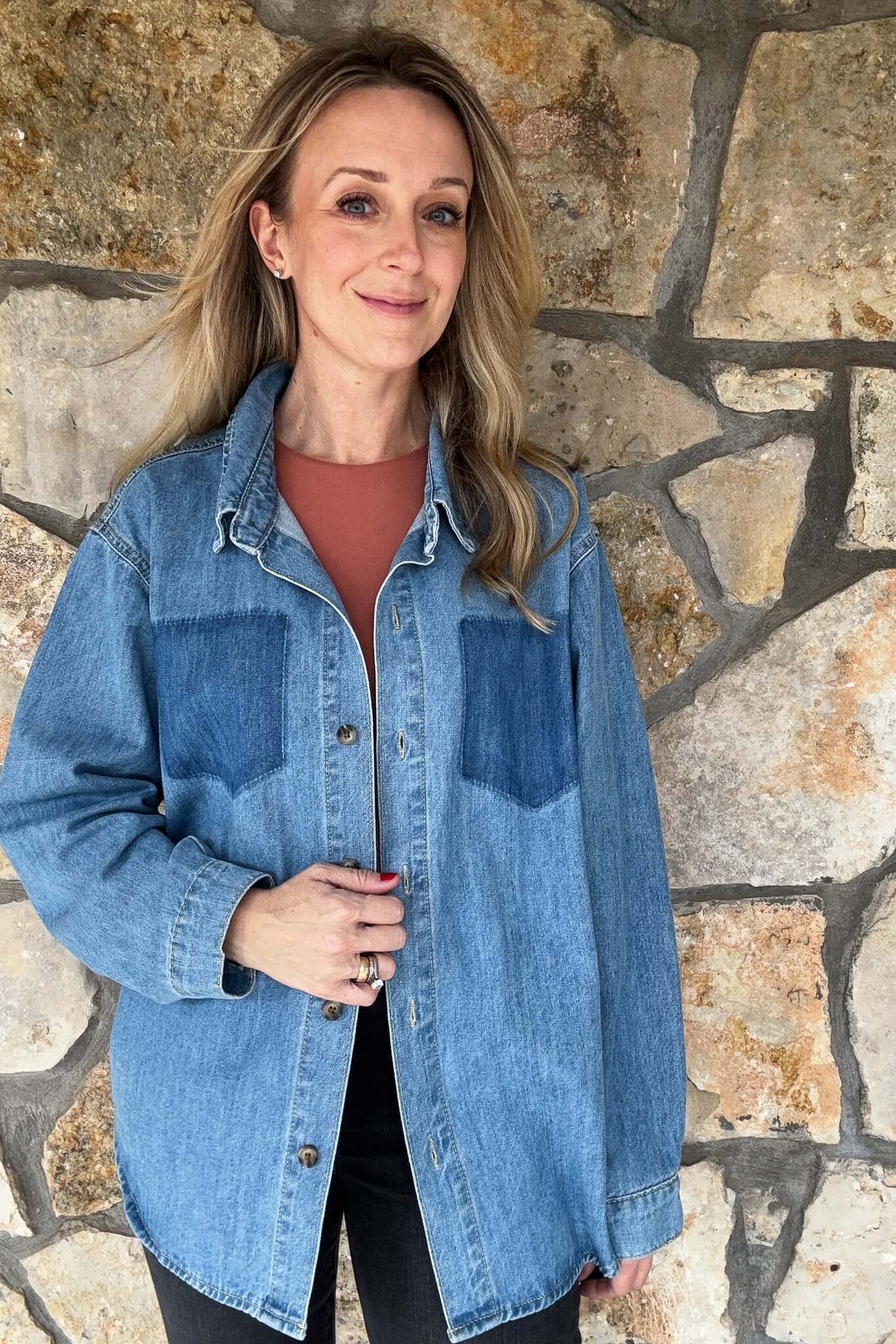 Elevate your wardrobe with our Denim Shirt, crafted from 100% cotton for maximum comfort. This button up shirt features trendy burnout pockets on the chest, adding a unique touch to the classic design. The slightly oversized fit allows for versatile styling options. Upgrade your style with this must-have piece!