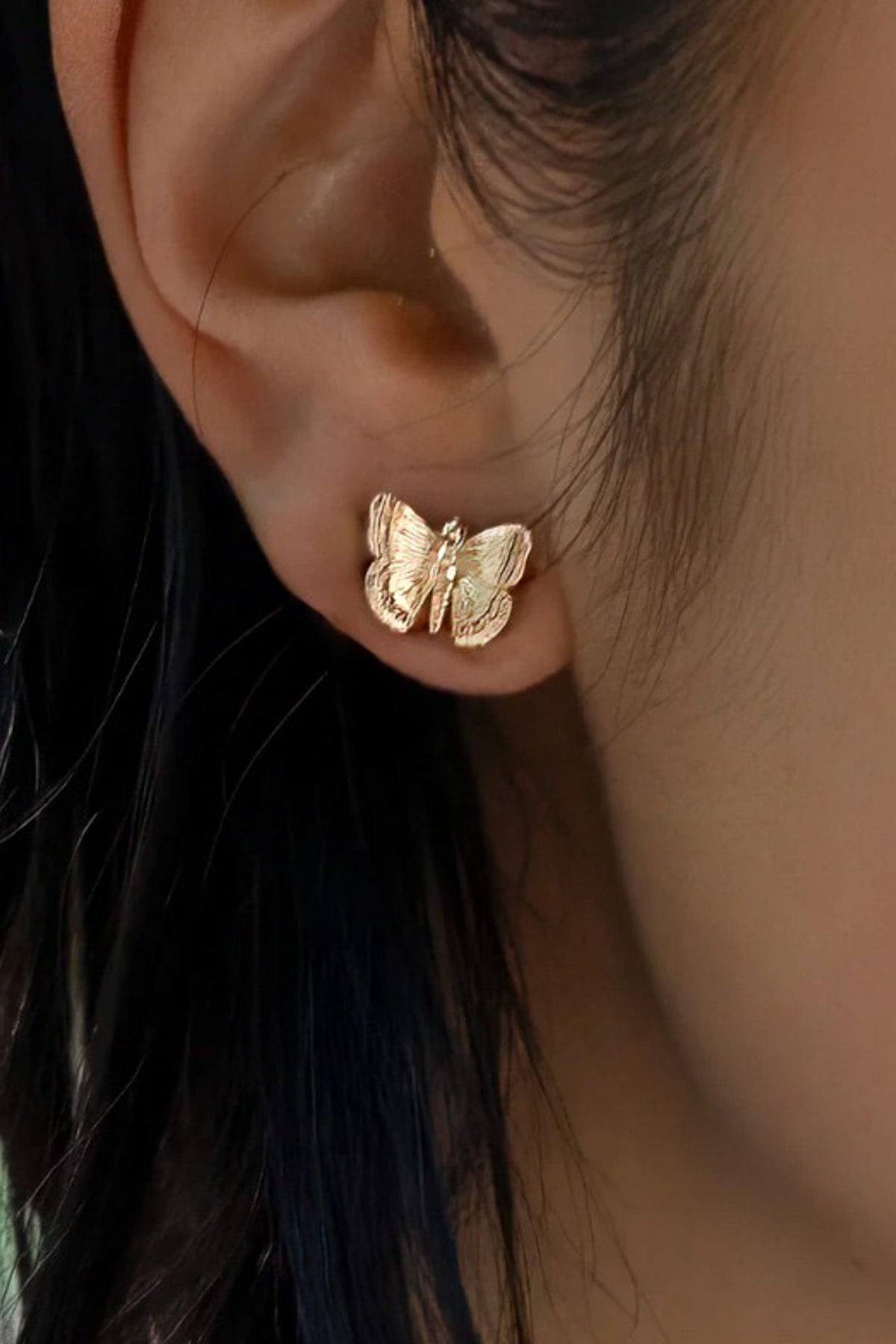Delicate and timeless, these butterfly stud earrings add a subtle touch of shine to any look. Their detailed wings and petite size make them an easy everyday favorite.