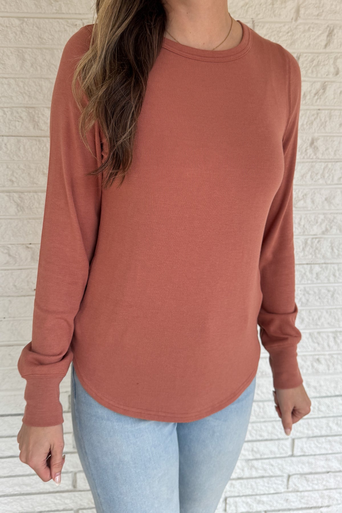 Soft, simple, and effortlessly flattering — this long sleeve top is your new everyday go-to. Made from luxe micro modal with a hint of stretch, it drapes beautifully and feels silky smooth against the skin. Perfect for layering or wearing solo with your favorite denim.