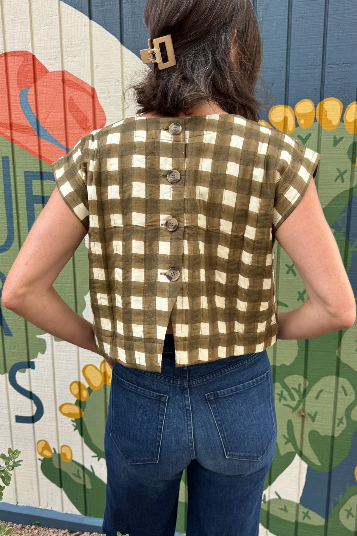 Neutral painted gingham cotton top with cap sleeves and a cropped boxy fit, available at Cotton & Cashmere in Blanco, Texas.