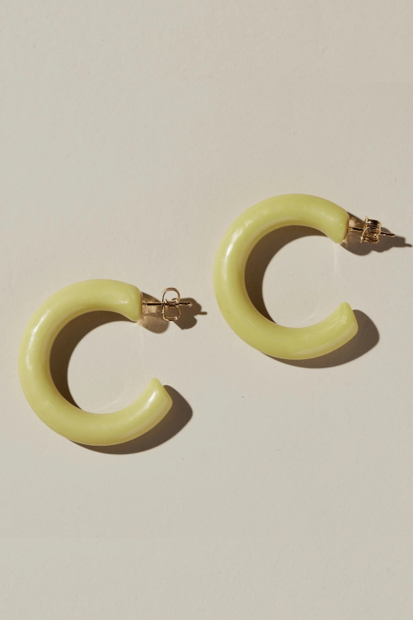chartreuse hoop earrings, acrylic hoop earrings, Italian earrings, made in Italy jewelry, lightweight hoop earrings, colorful statement earrings, titanium post earrings, nickel free earrings, women’s fashion jewelry, boutique earrings, modern hoop earrings, playful earrings, effortless style accessories, women’s jewelry online, Cotton & Cashmere boutique, Blanco Texas boutique, statement hoop earrings, chic women’s accessories