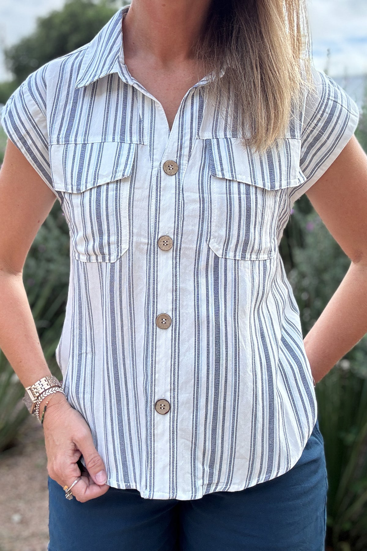 striped button up top
women’s striped shirt
blue and white striped top
casual button up shirt
short sleeve button up top
women’s everyday tops
collared striped shirt
boutique tops for women
effortless style boutique
Cotton and Cashmere Blanco Texas
women’s clothing boutique Blanco TX
casual summer tops
easy women’s fashion
Blanco Texas boutique shopping
women’s fashion Blanco TX