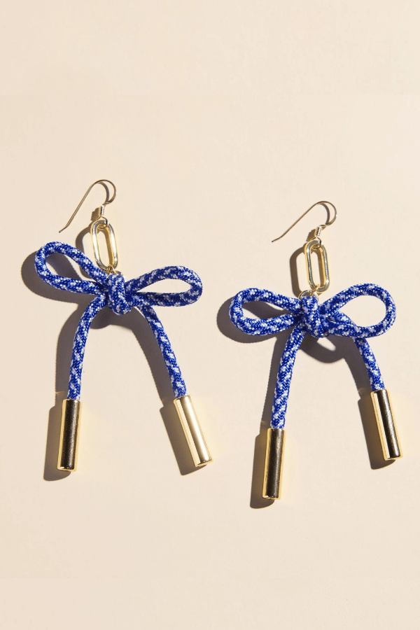 blue and white earrings, cord statement earrings, nylon rope earrings, paracord earrings, lightweight statement earrings, game day earrings, vacation earrings, blue statement earrings, gold hook earrings, silver hook earrings, nickel free earrings, hypoallergenic earrings, women’s fashion jewelry, boutique earrings, effortless style accessories, Cotton & Cashmere boutique, Blanco Texas boutique, women’s jewelry online