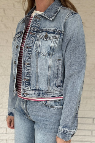 This 100% cotton denim jacket is an easy, everyday layer you’ll reach for all seasons. It has a clean, classic look with a modern cropped length that hits right above the waist on the model. Structured but comfortable, it’s perfect over tees, dresses, and tanks. Women's fashion boutique Blanco Texas Johnson City Texas