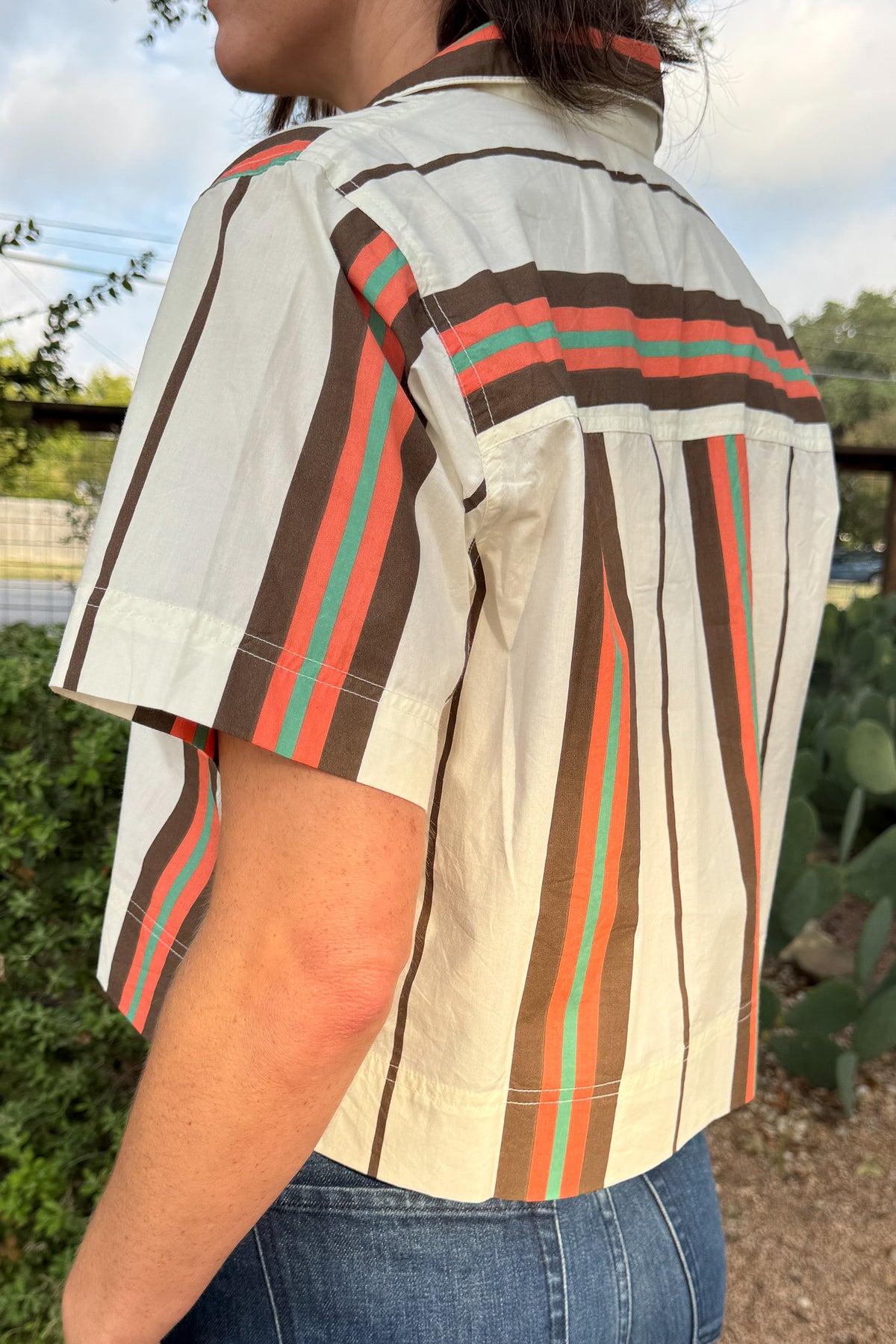 Striped cotton poplin top for women featuring a cropped silhouette, collared neckline, and easy relaxed fit.