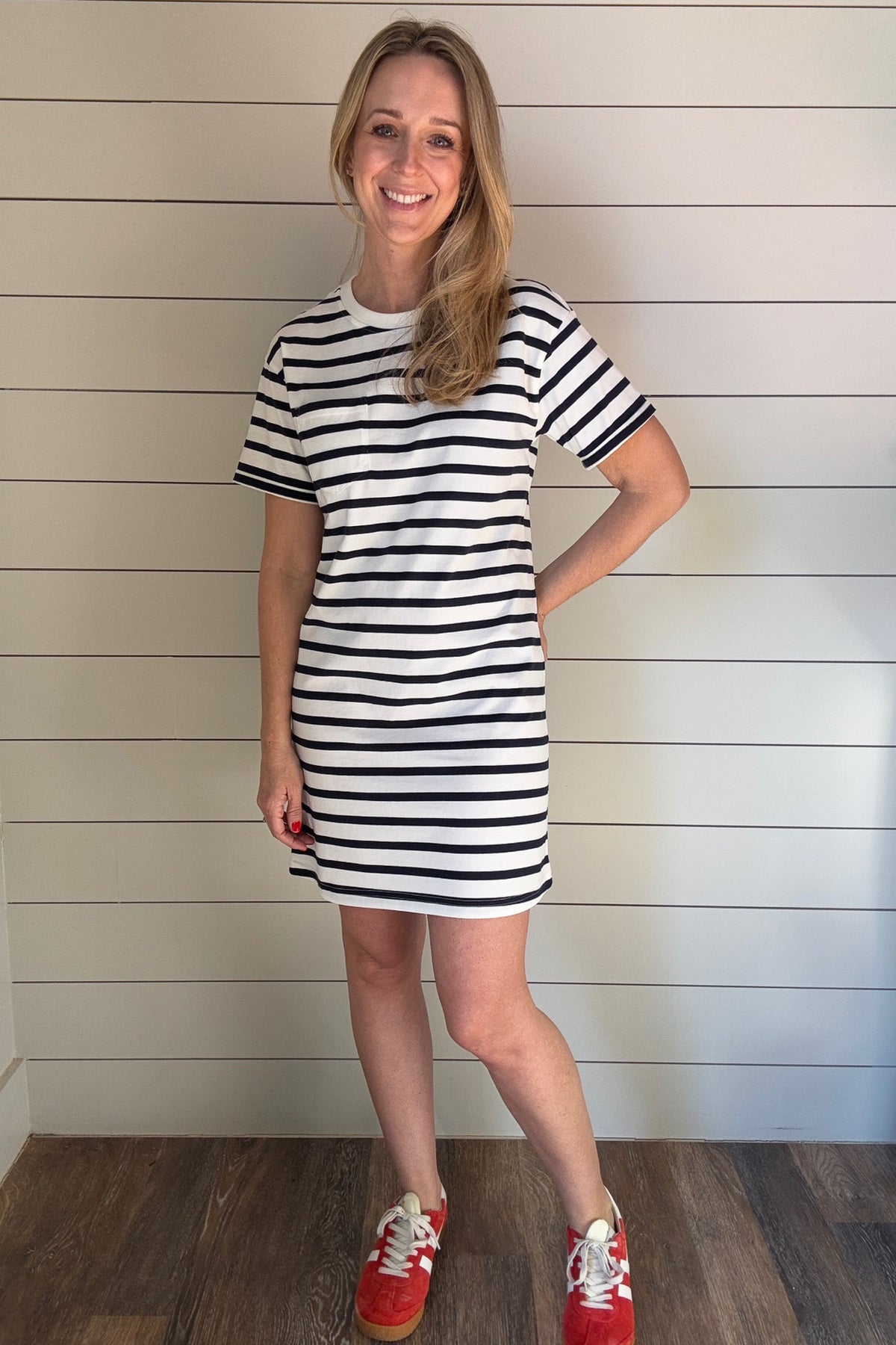 Say hello to spring with the Kickback Cotton Striped Dress! This adorable knee-length dress is perfect for any occasion, whether you're headed to the flower market or a PTO meeting. With a single chest pocket and the ability to pair it with a denim jacket and colorful sneakers, this dress is ready for anything.